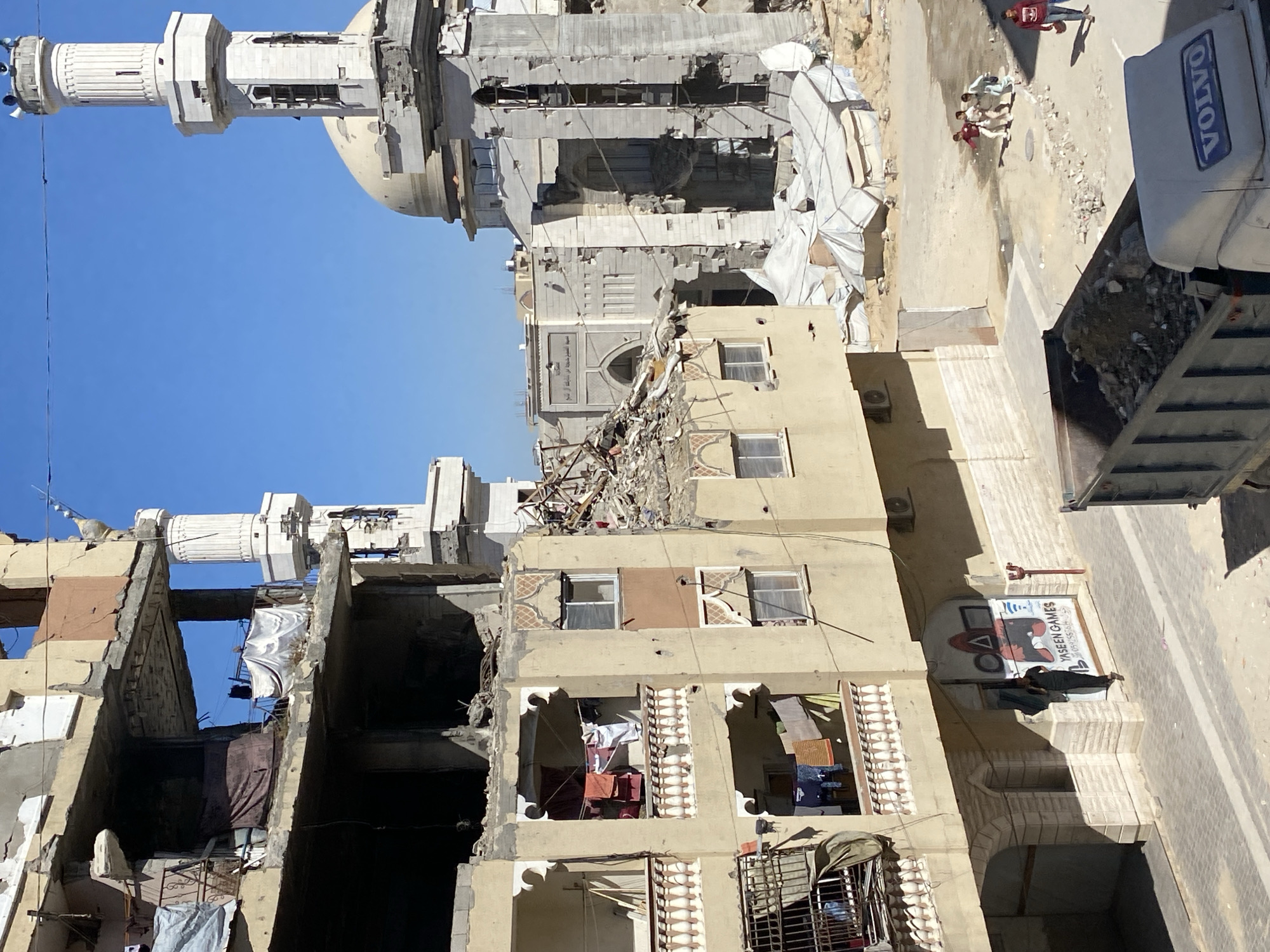 Debris removal operations continue in damaged Khan Yunis district