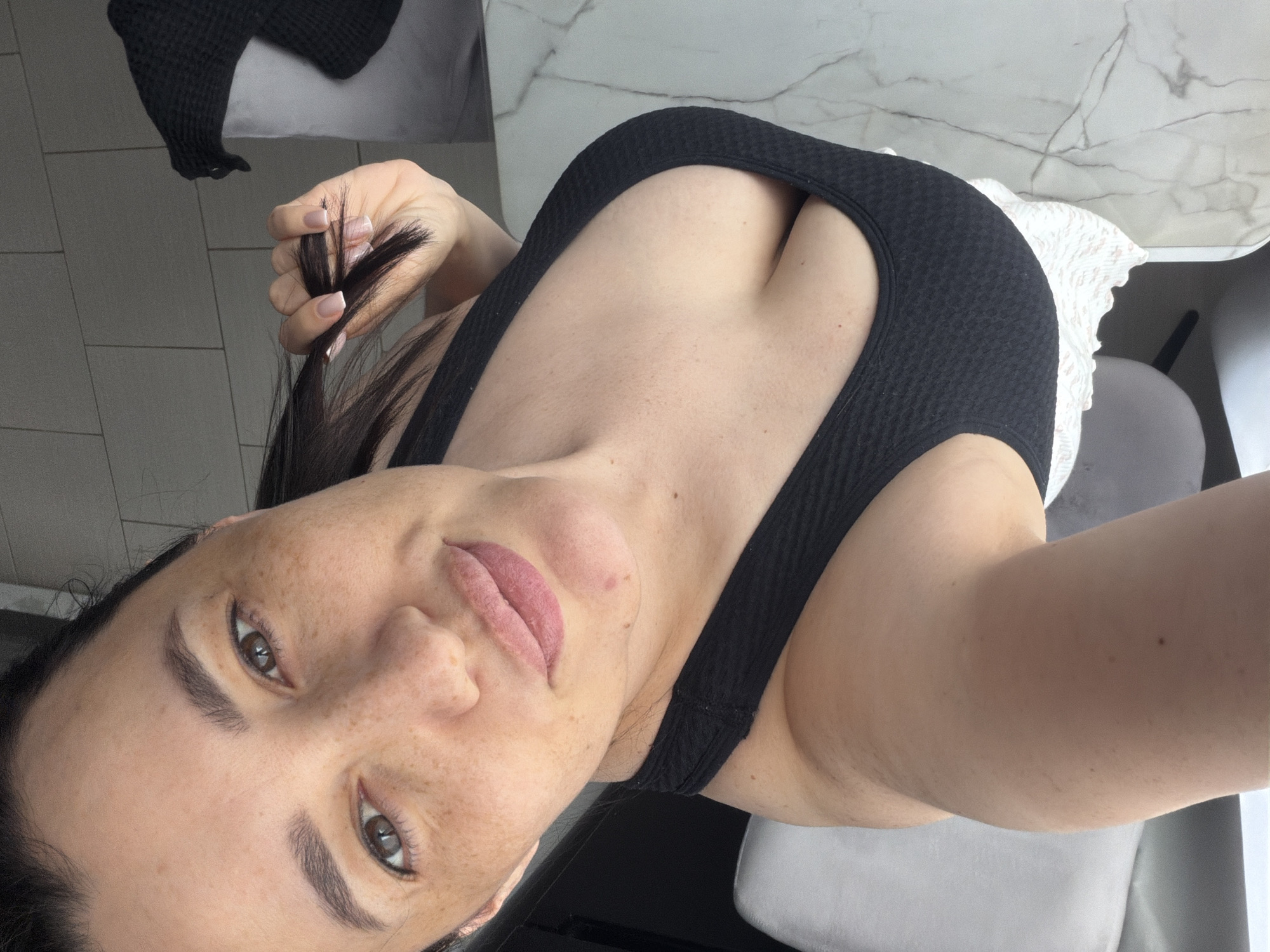 Woman takes selfies in Russian residential area