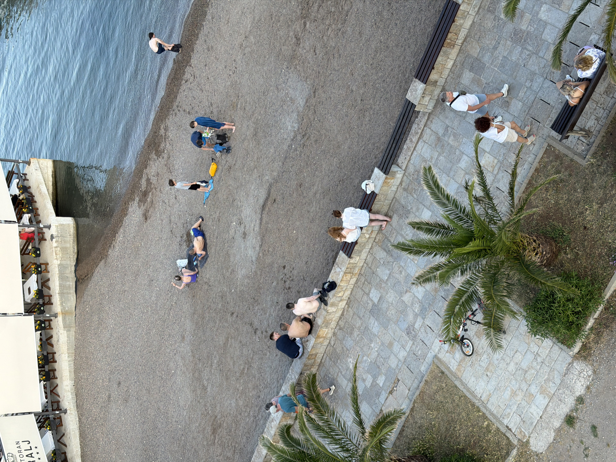 Families enjoy Ferris wheel and music festival in coastal Budva