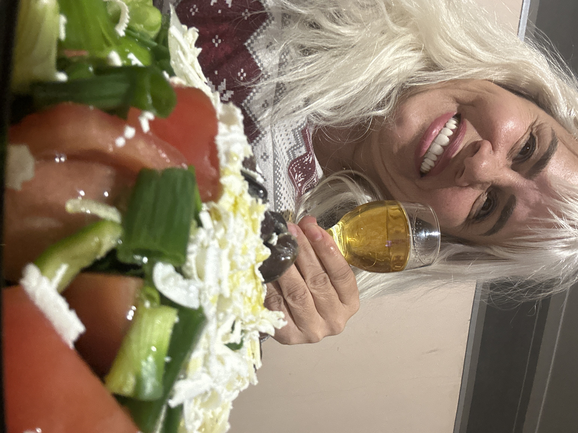 Person enjoys fresh strawberries in Sofia container