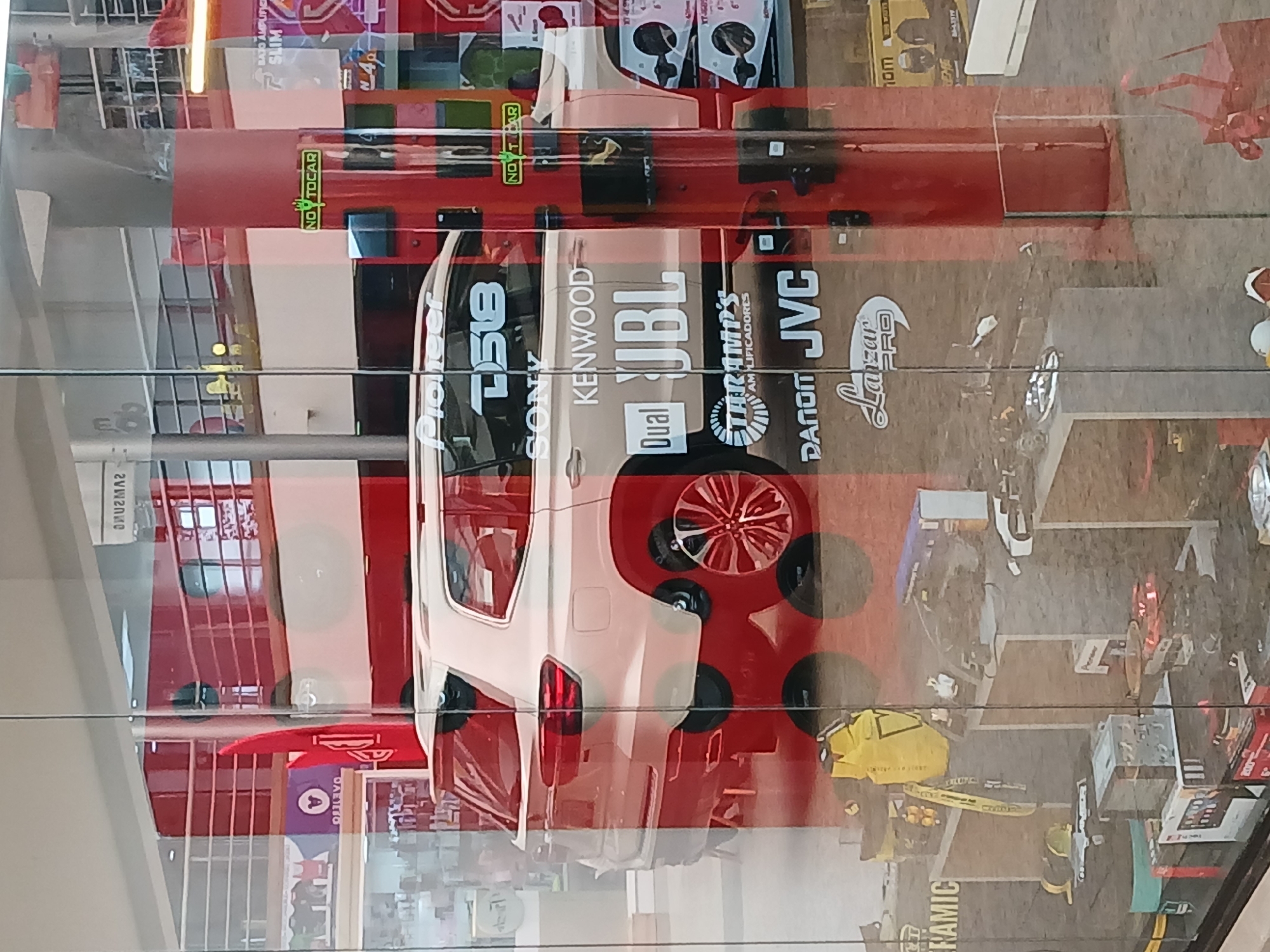 Evening retail window shopping captured in Ciudad Guayana