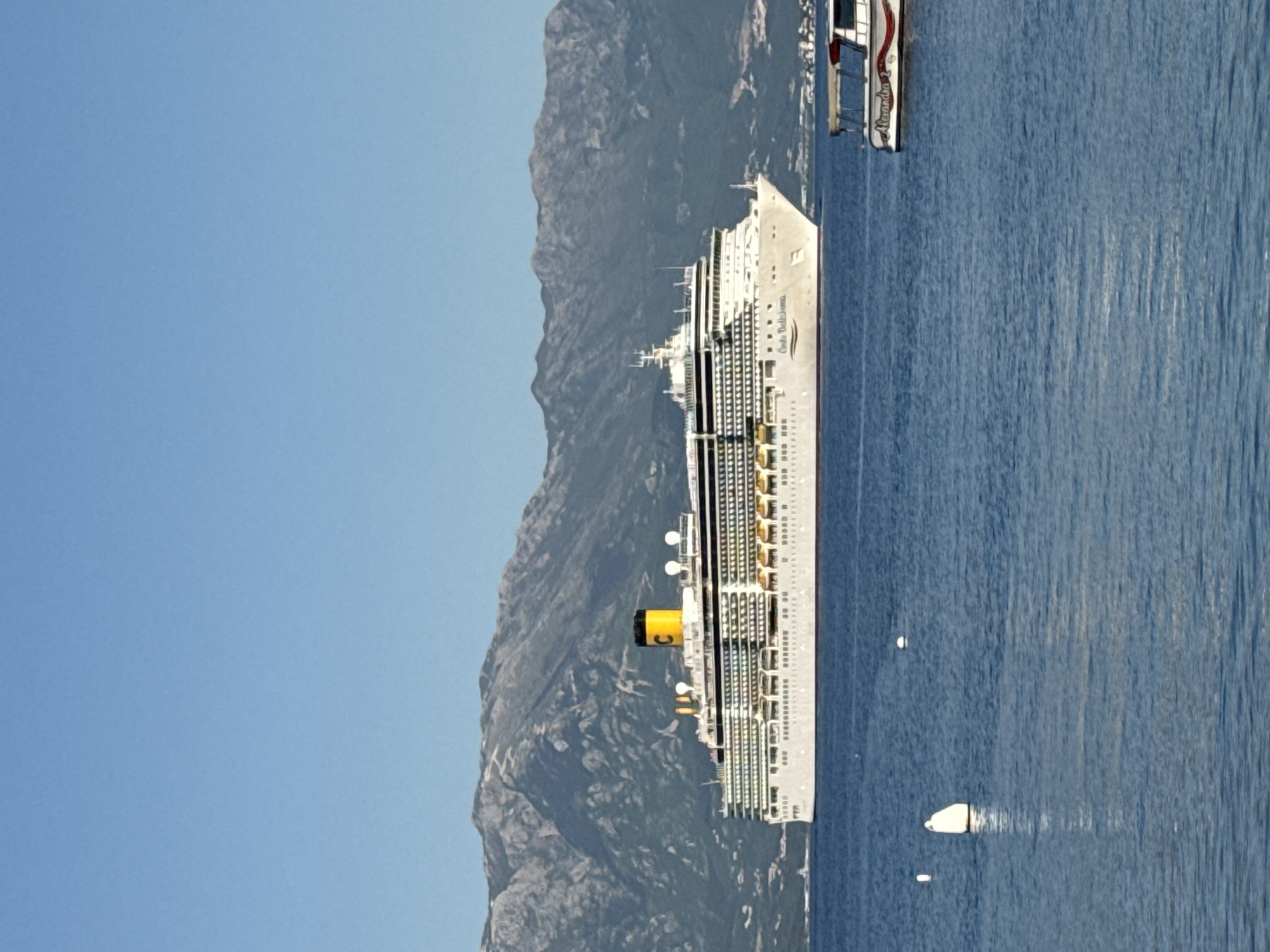 Costa Deliziosa cruise ship docks in Đenovići Montenegro harbor