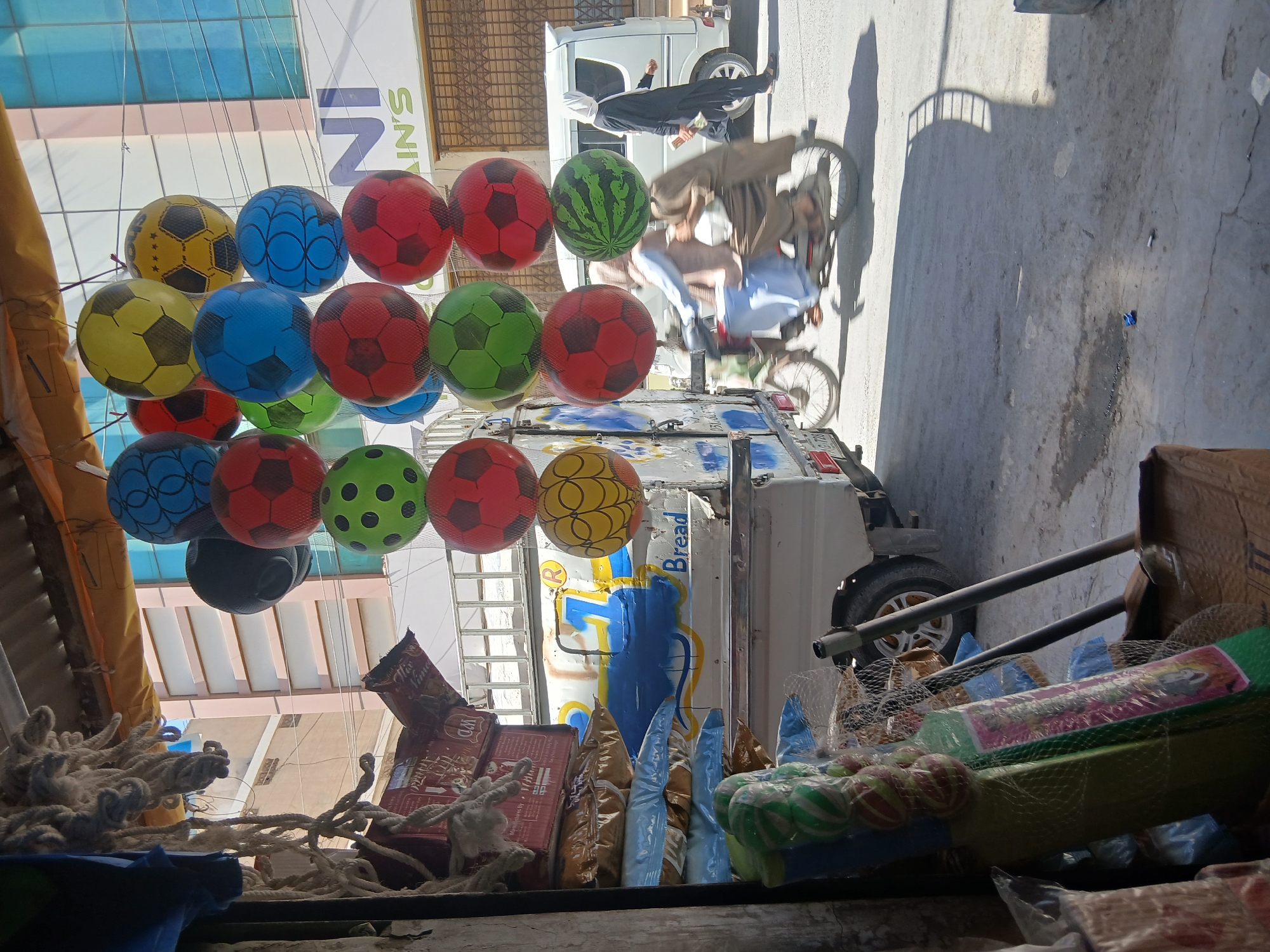Street vendor sells soccer balloons in Quetta, Pakistan