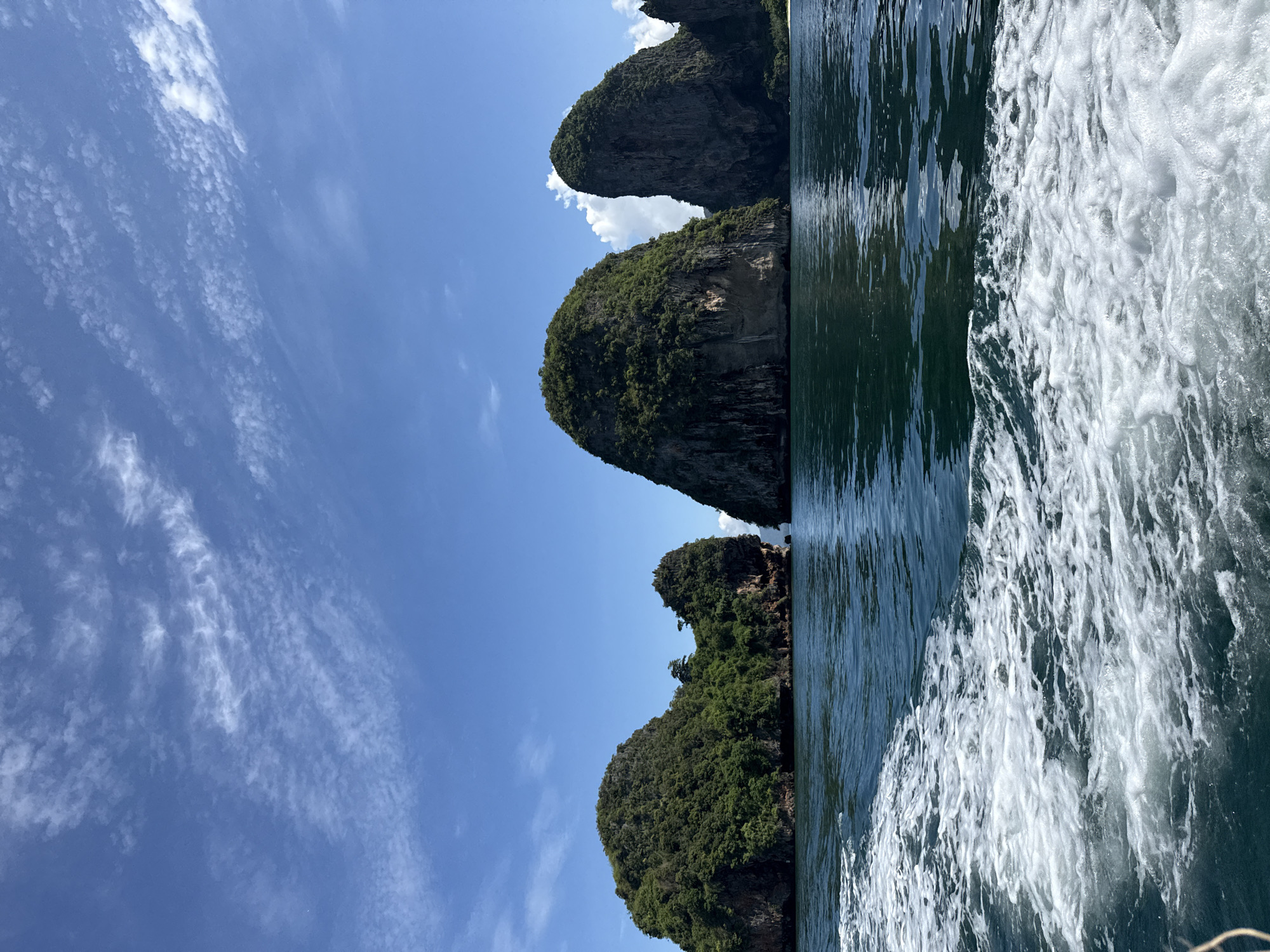 Boat journey past karst islands in Ao Nang waters