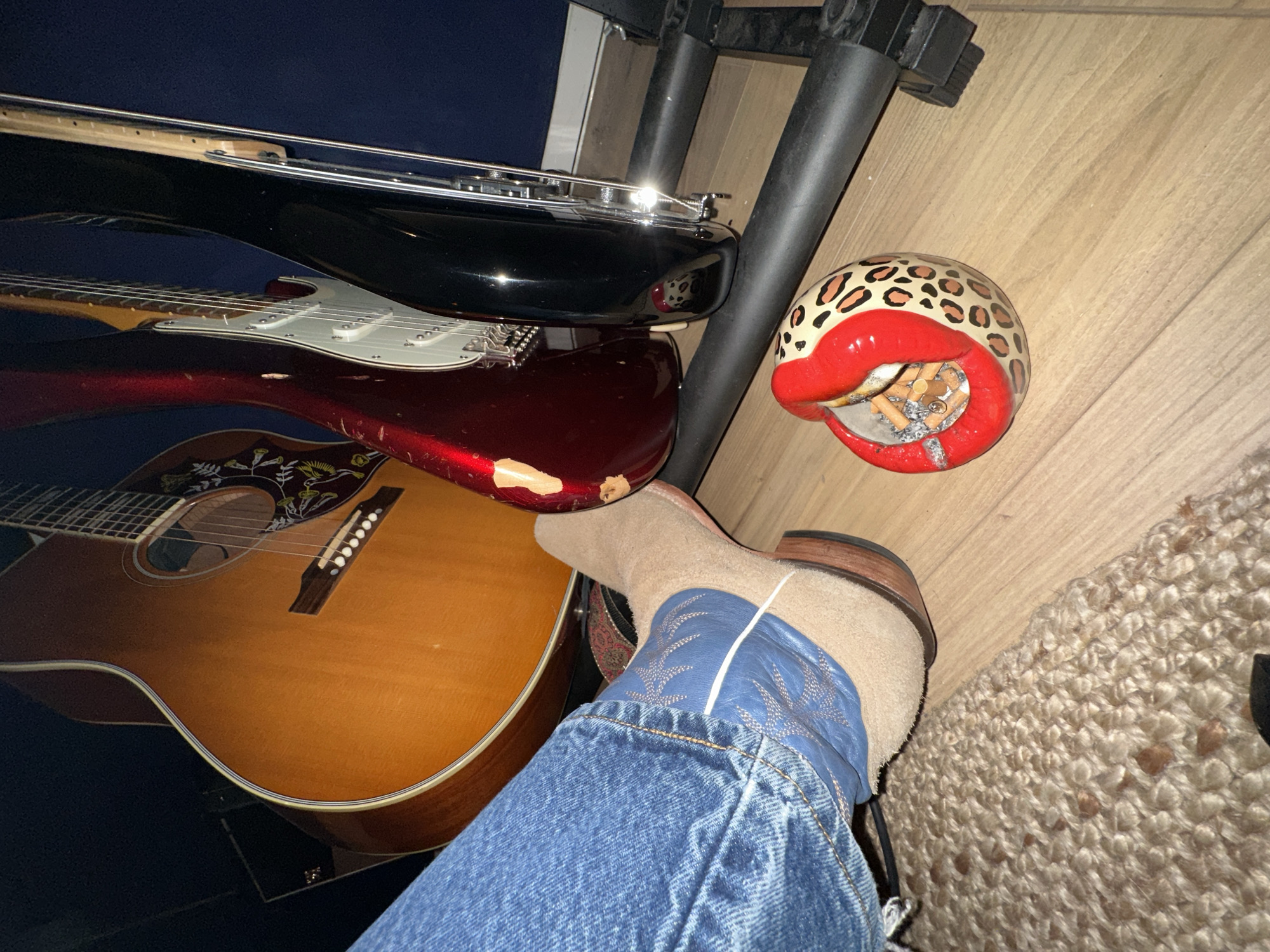 Young musician records acoustic guitar session in Paris studio