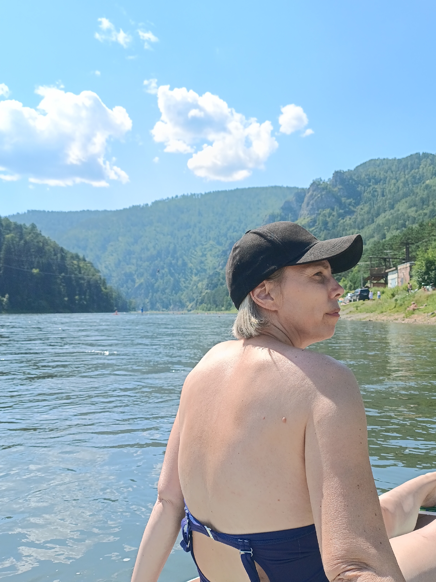 Summer paddleboarding session on the Mana River, Russia