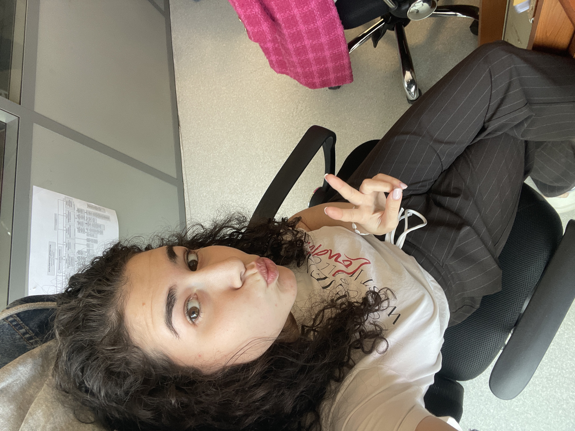 Woman documents morning office routine in Sofia with selfies