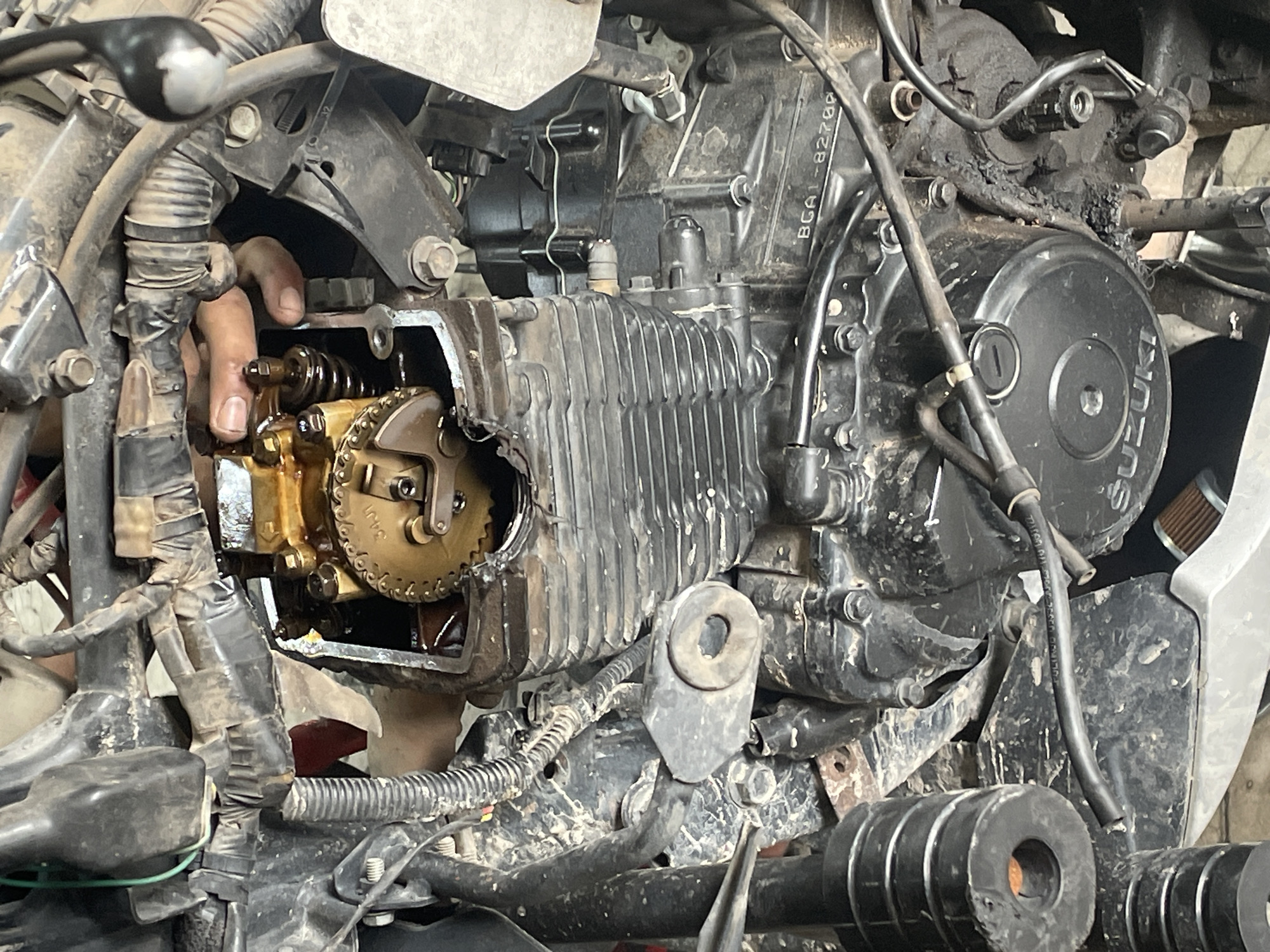 Early morning motorcycle repair work documented in Dhaka shops