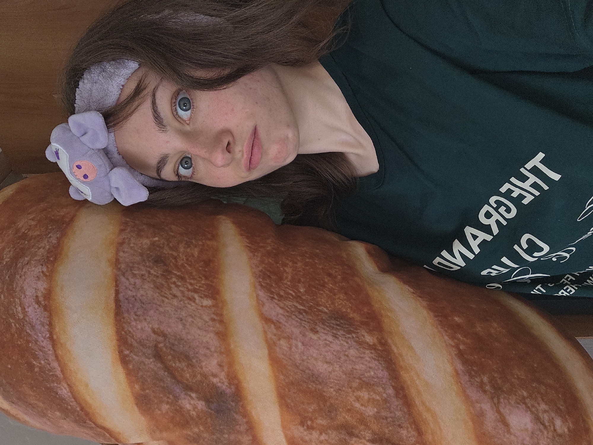 Woman takes playful selfies with pig headband in Chita