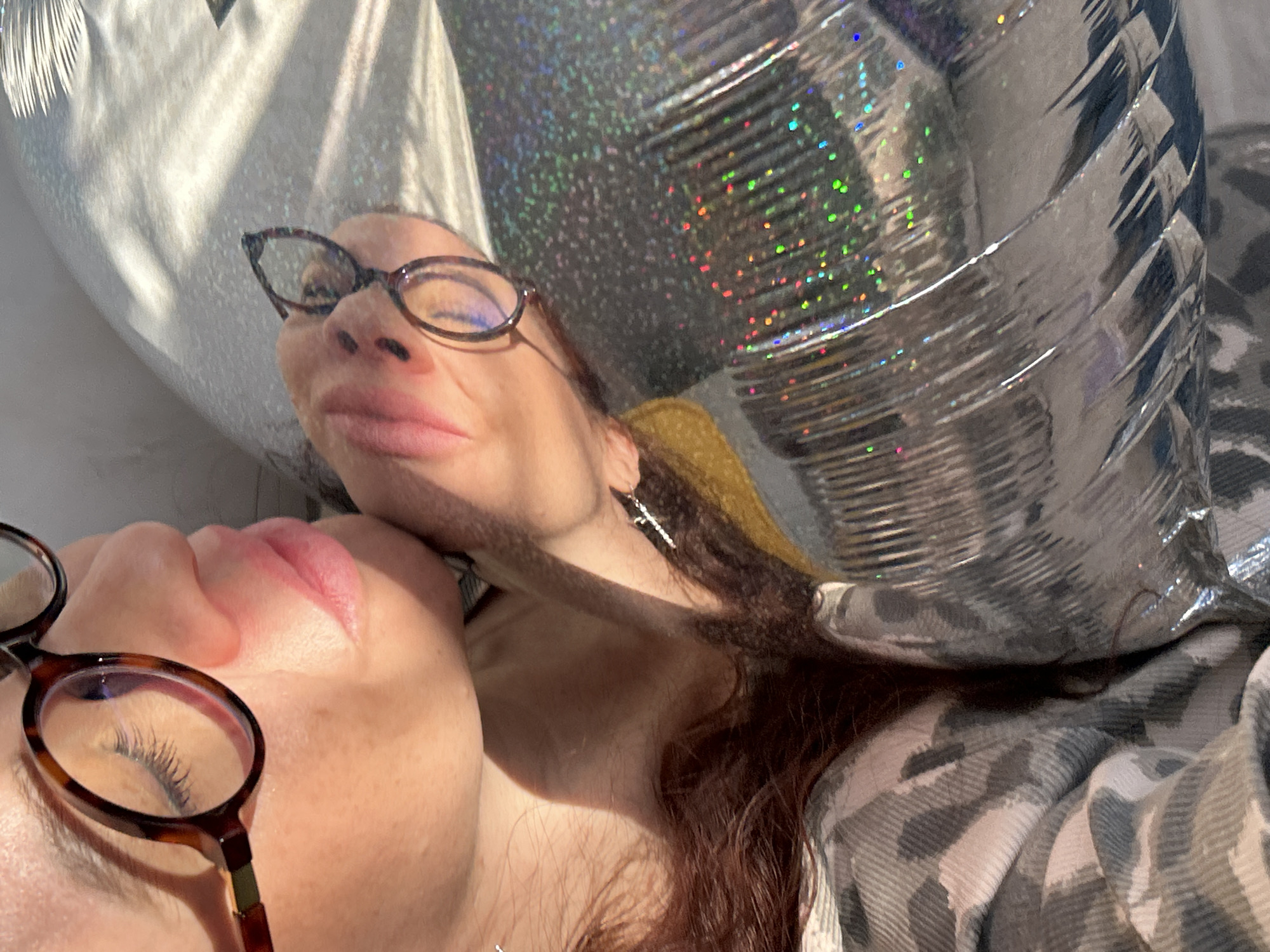 Two people photographed in sunlight in Chaikovsky, Russia