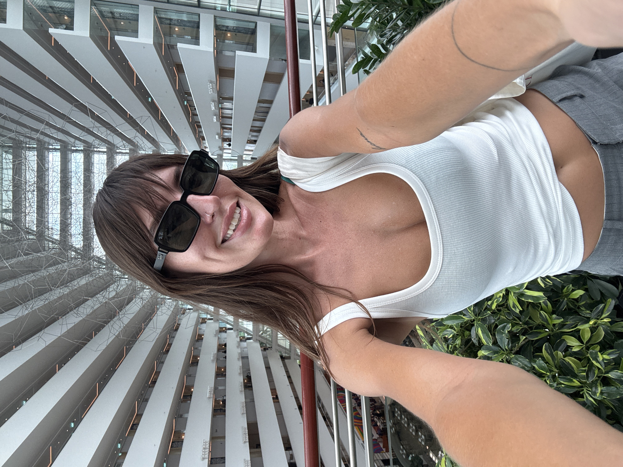 Atrium selfies and a red boat ride on turquoise water