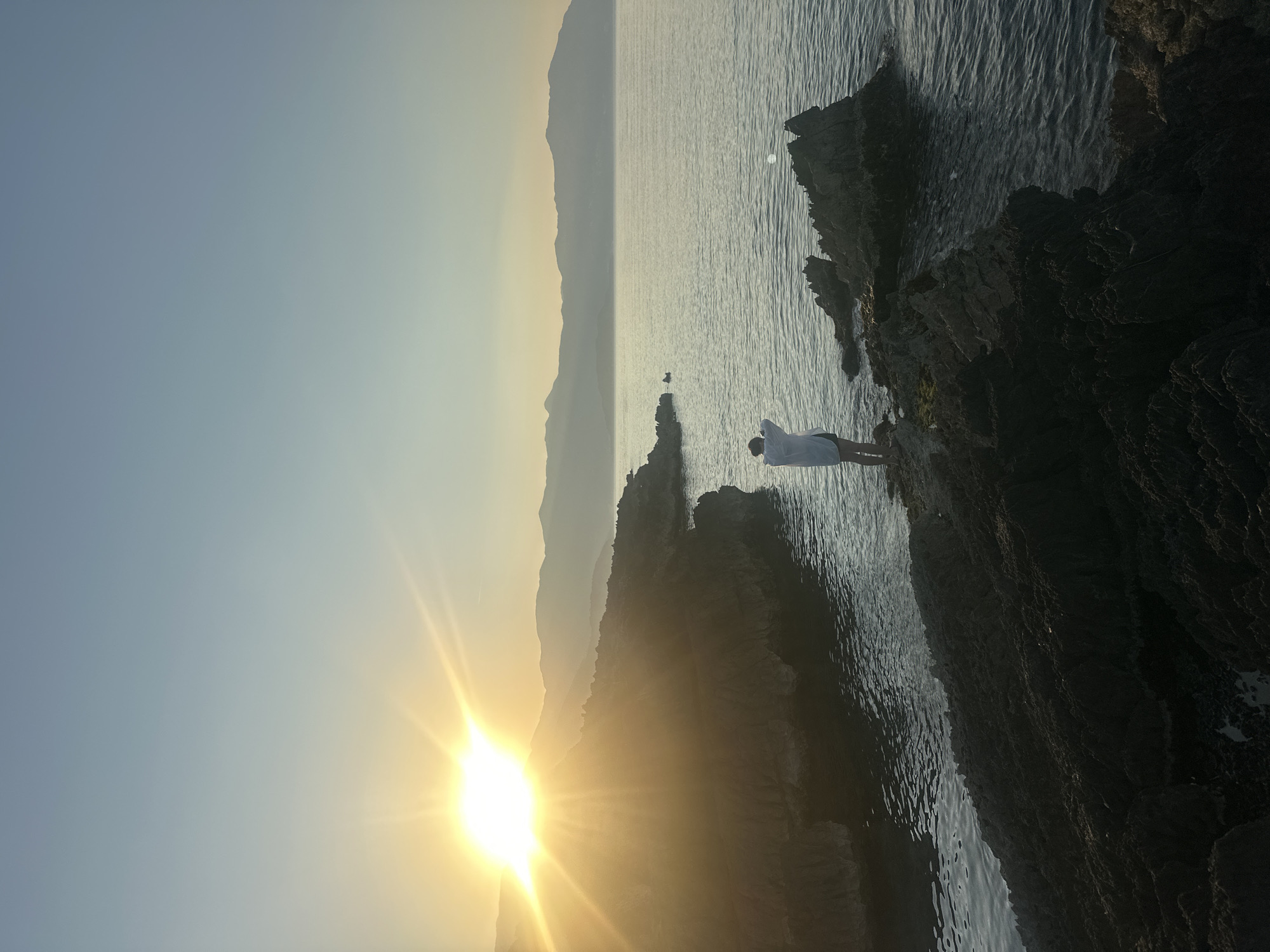Rocky Adriatic coastline near Podlastva, lighthouse and tide pools