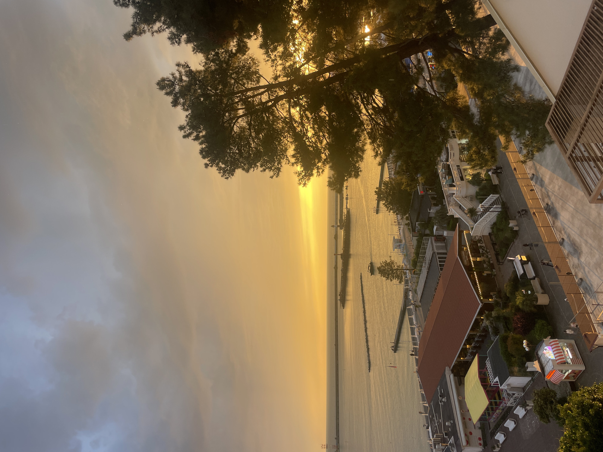 Tourists capture sunset moments in Sochi's coastal district