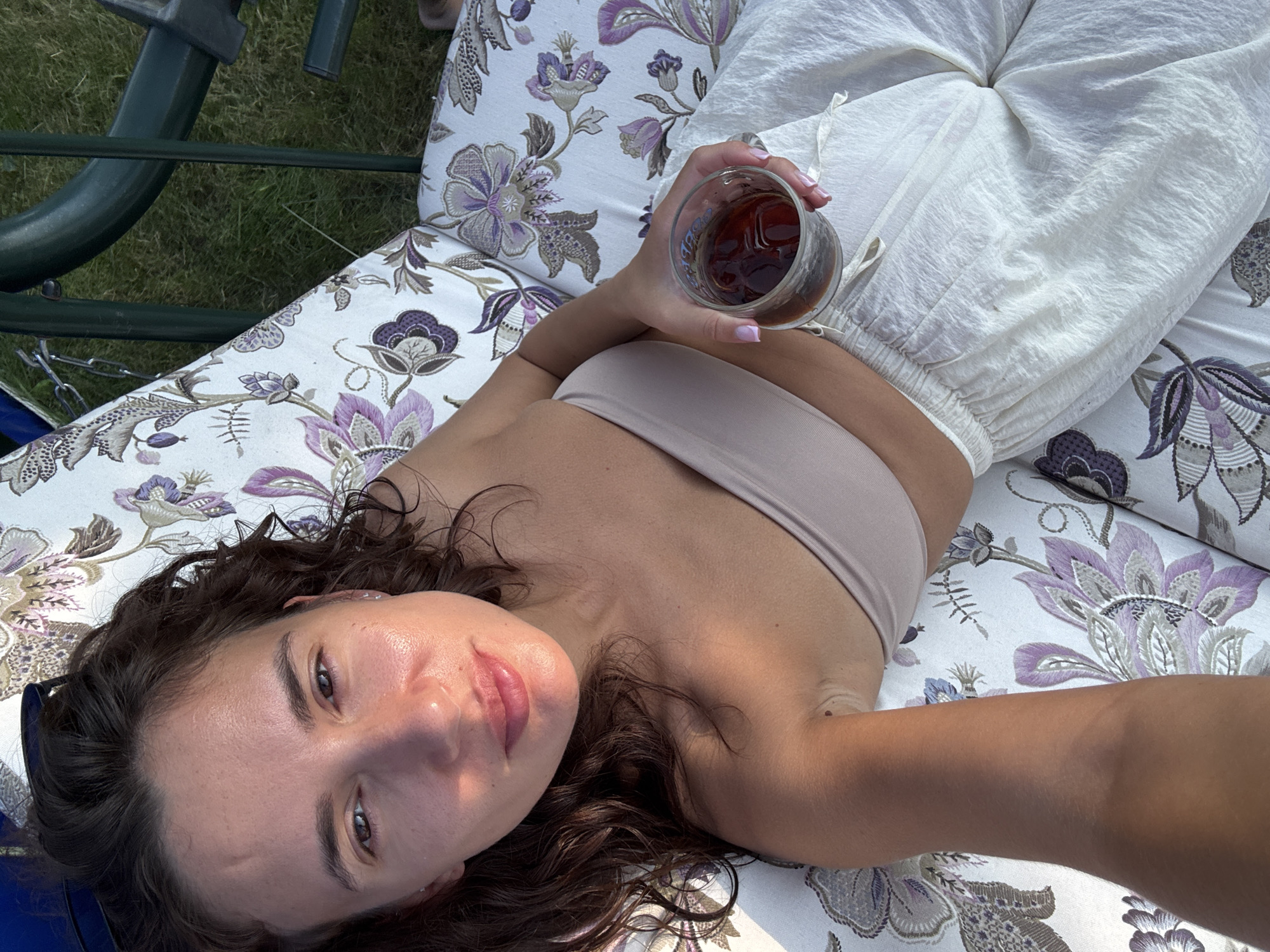 Lazy summer afternoon on a backyard swing in Chaikovsky