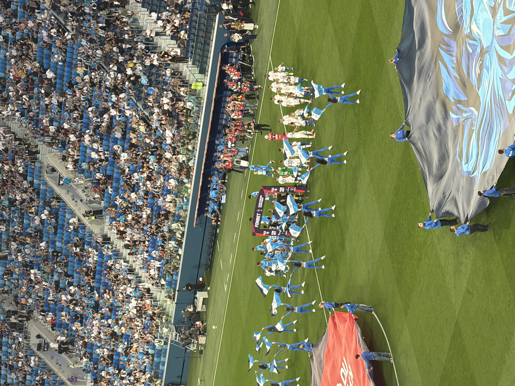 Packed stadium, blue and white fans deep into matchday