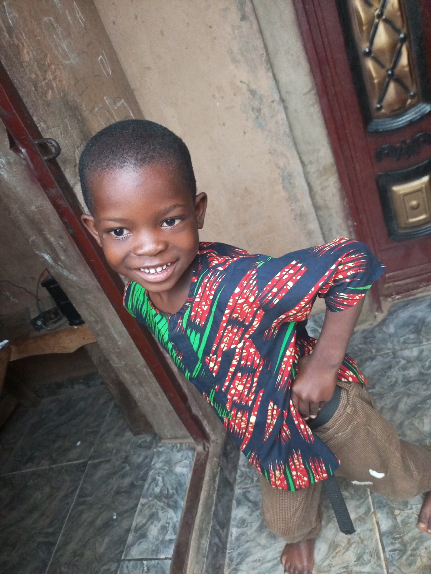 Quiet morning moments around homes and cars in Nigeria