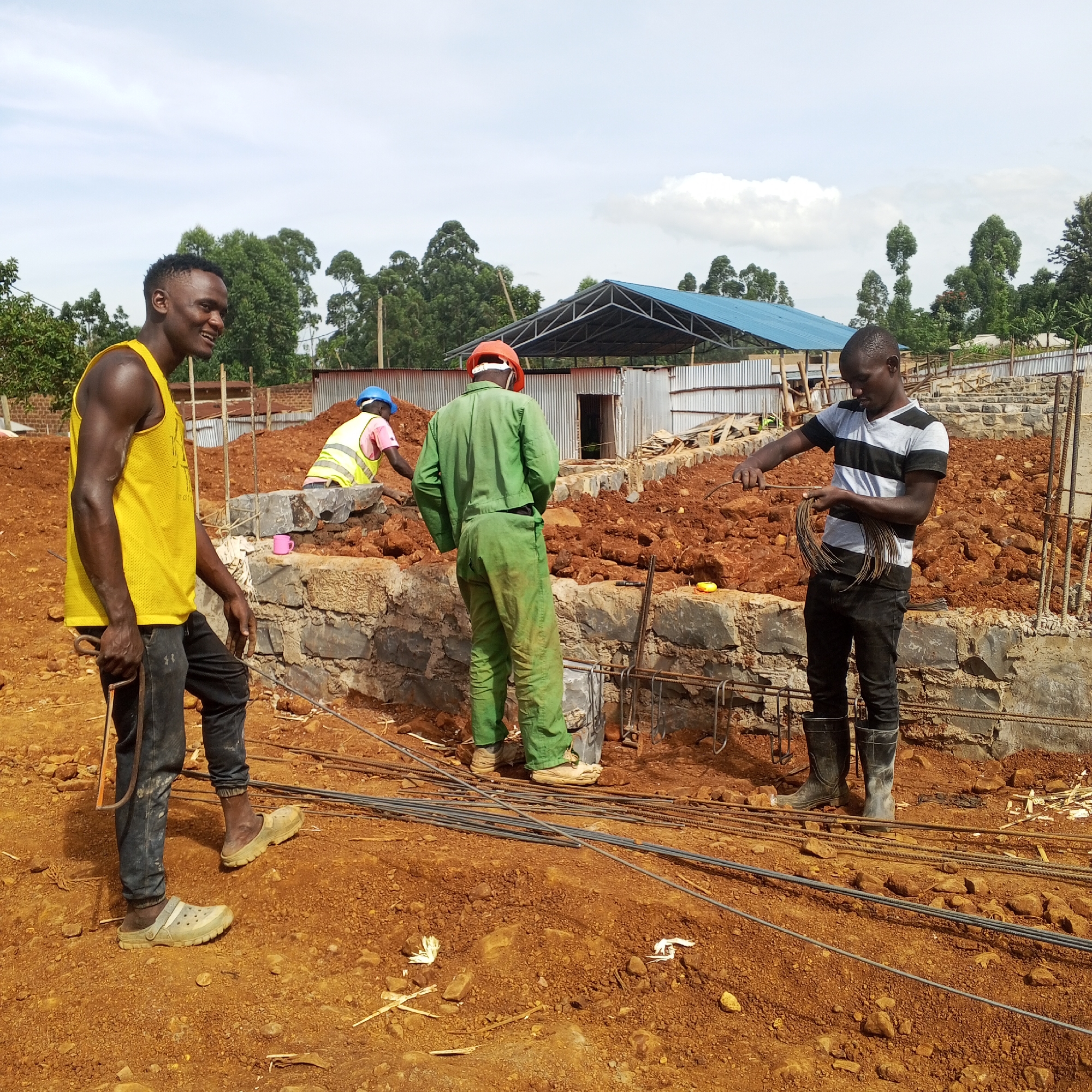 Construction worker performs manual labor in Borabu Chitago ward
