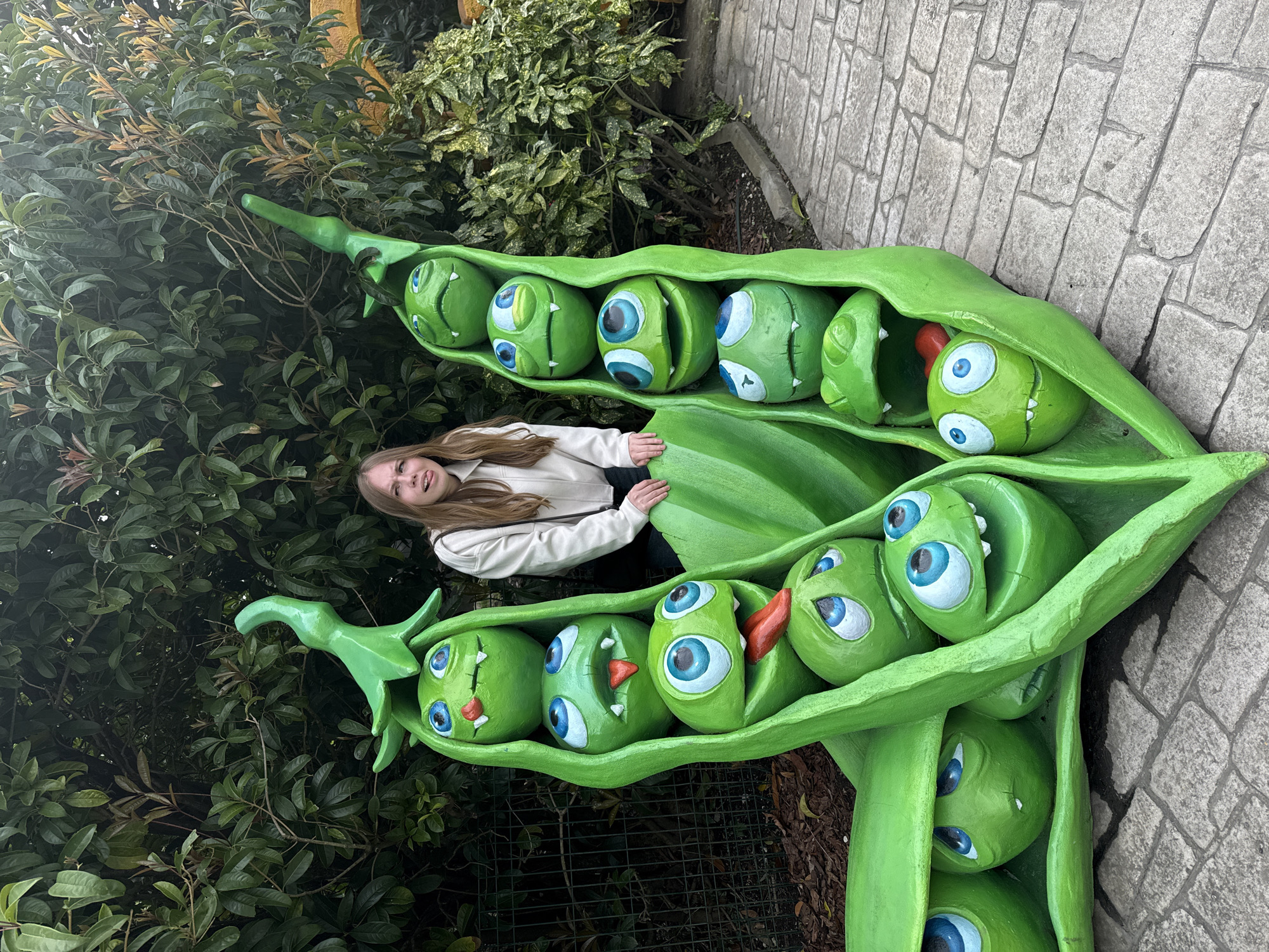 Tourist explores whimsical sculptures at Sochi Park, Russia