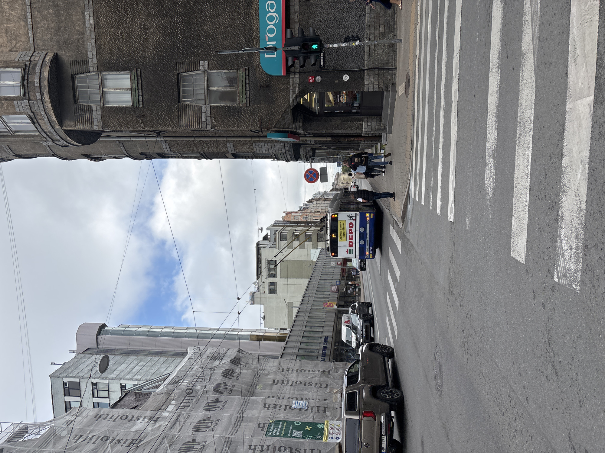 Morning street scenes across central Riga on a grey August day