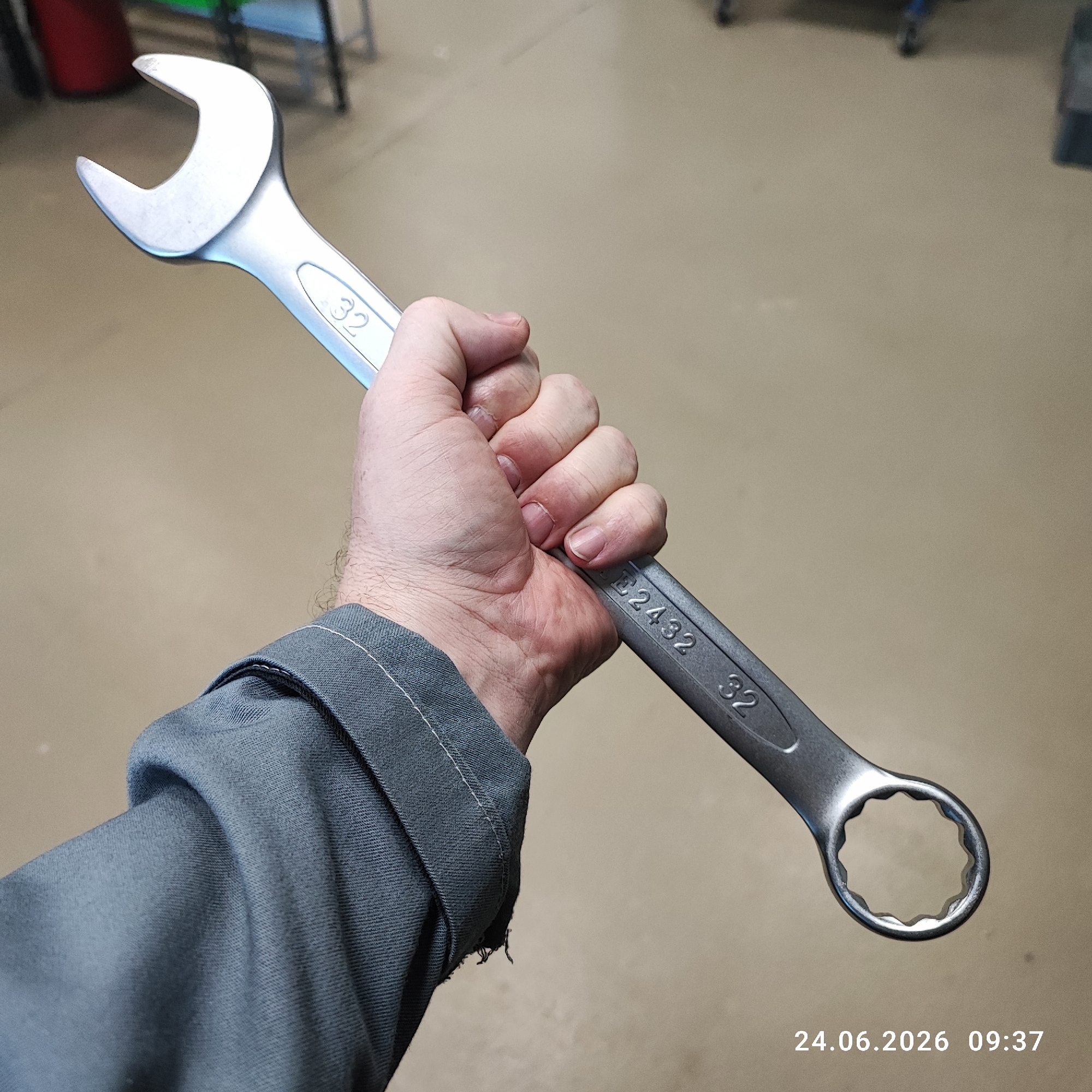 Large size 32 combination wrench held up in Lytkarino
