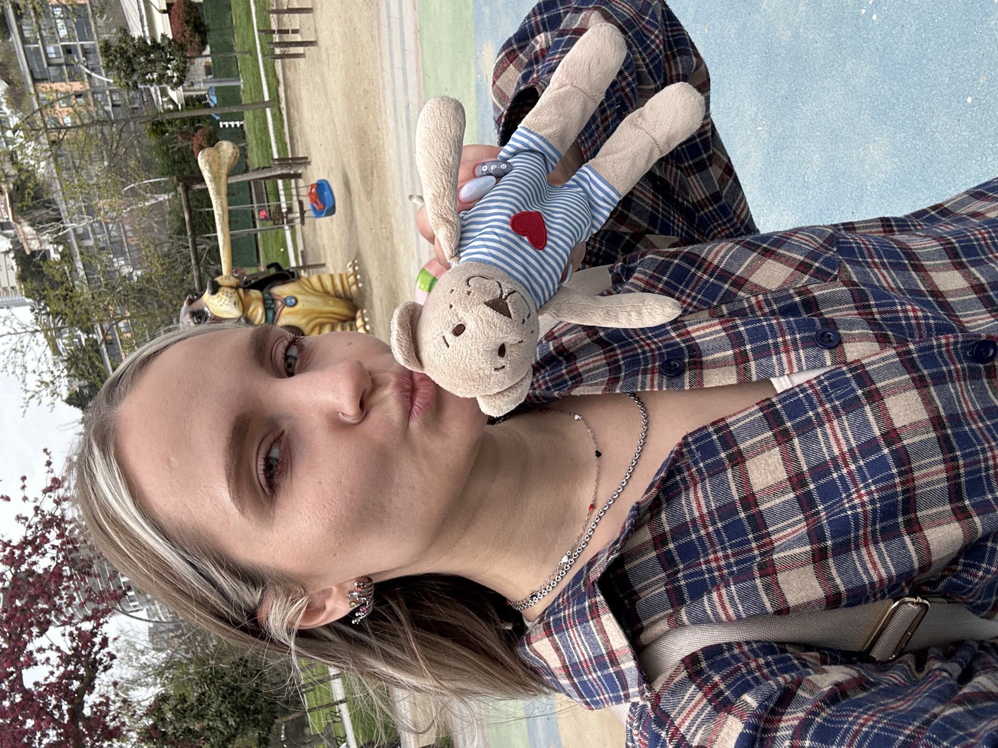 Woman and child captured in casual park moments in Başakşehir