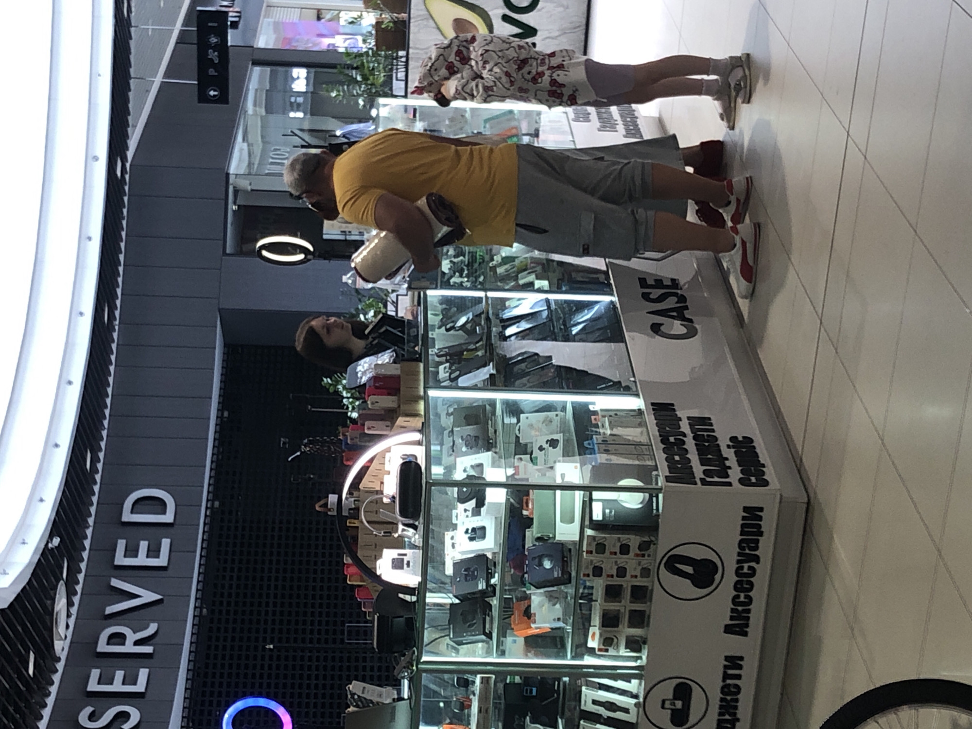 Inside a Chernihiv shopping mall on a summer afternoon