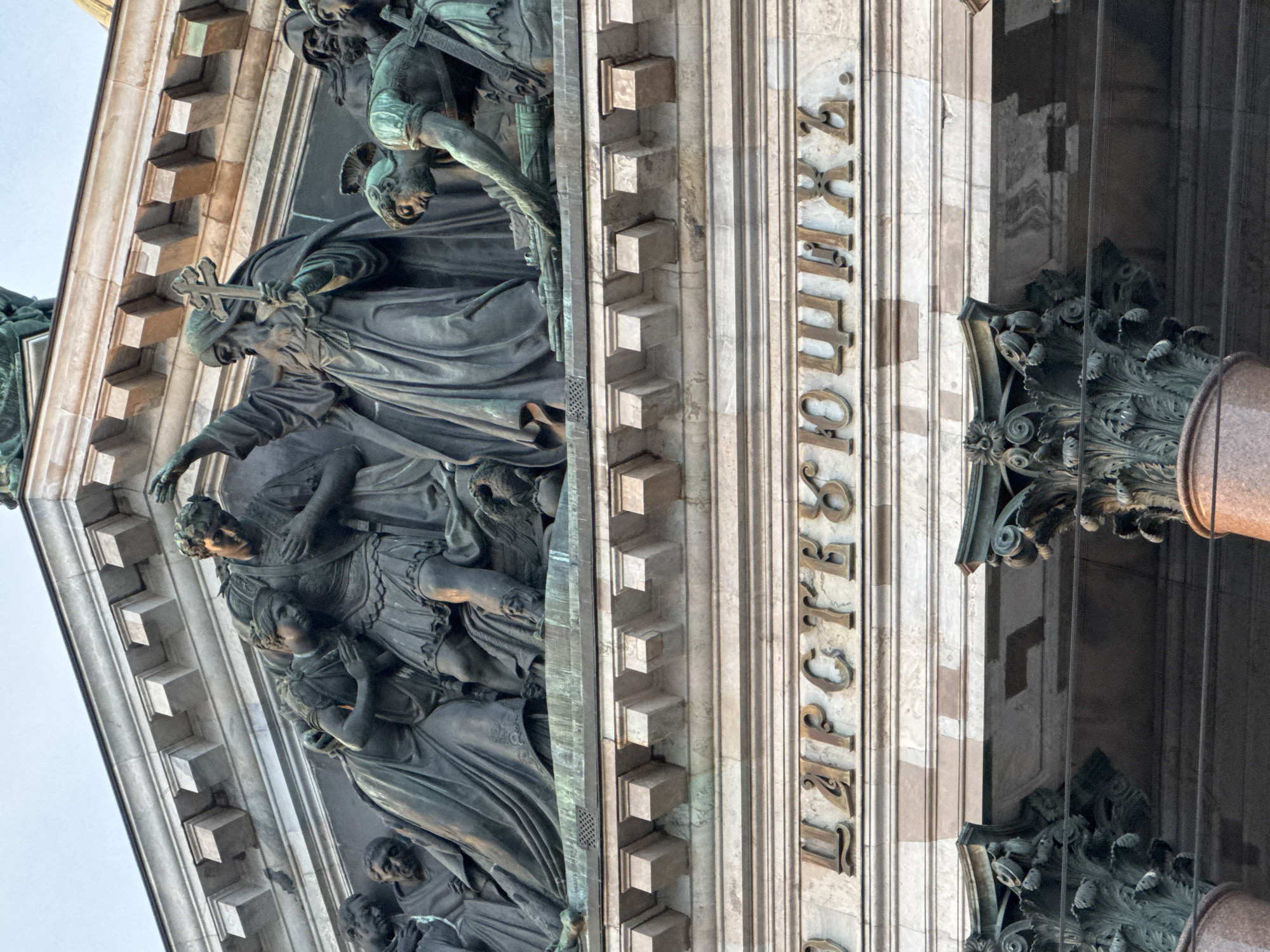 Tourist documents St. Isaac's Cathedral facades and surroundings