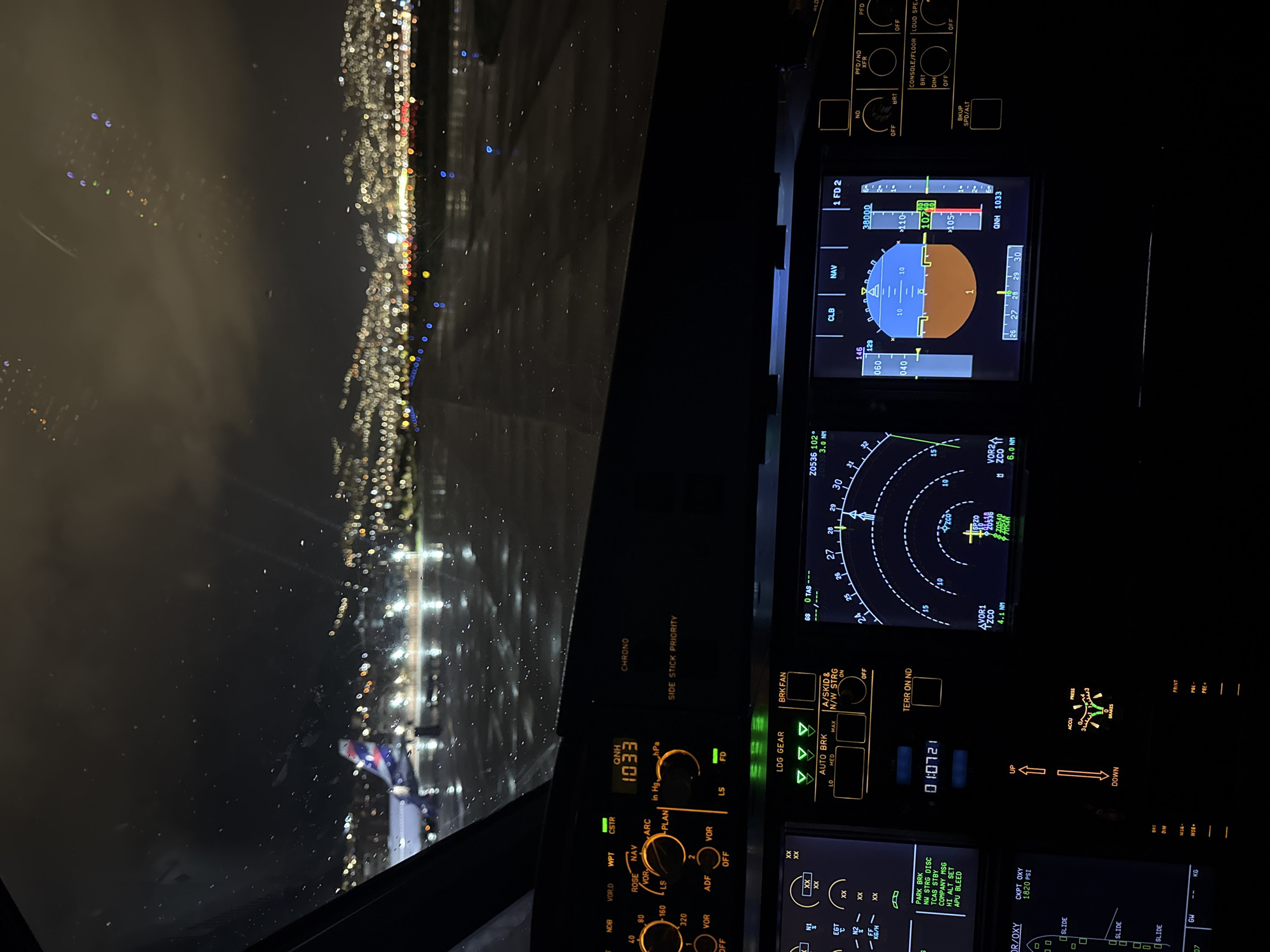 Night landing approach captured from aircraft cockpit over Peru