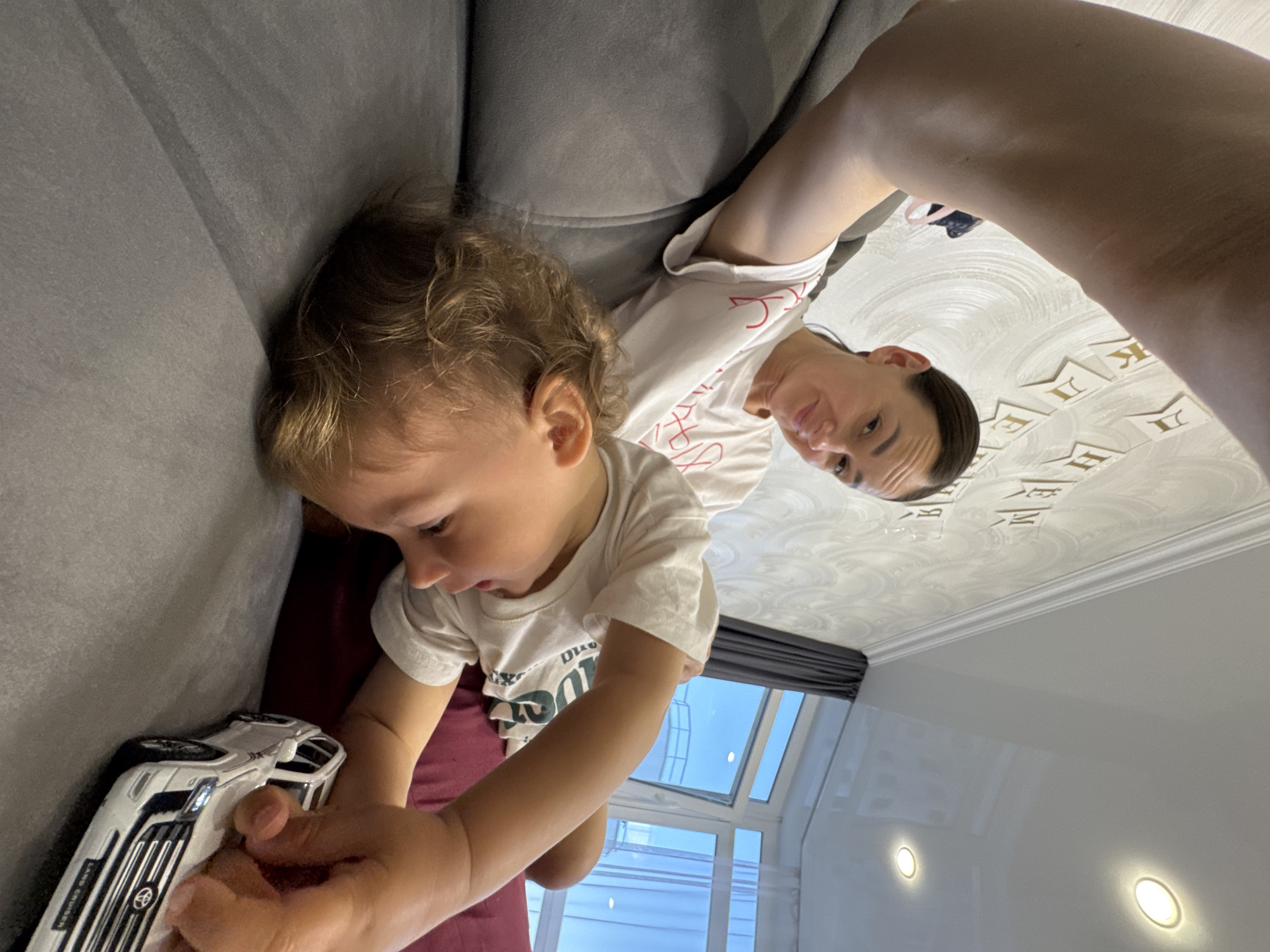 Family moments captured during afternoon playtime in Sochi apartment