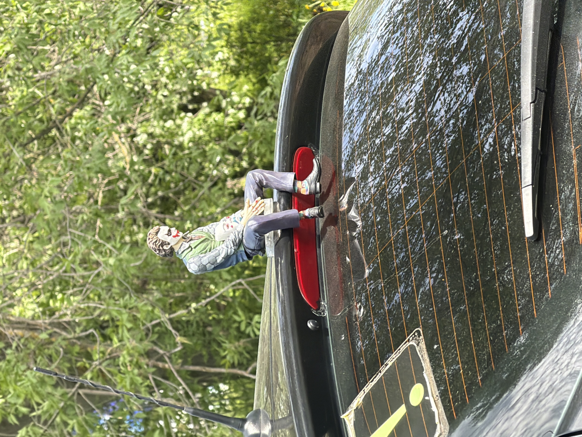 Joker figurine spotted on parked car in Izhevsk
