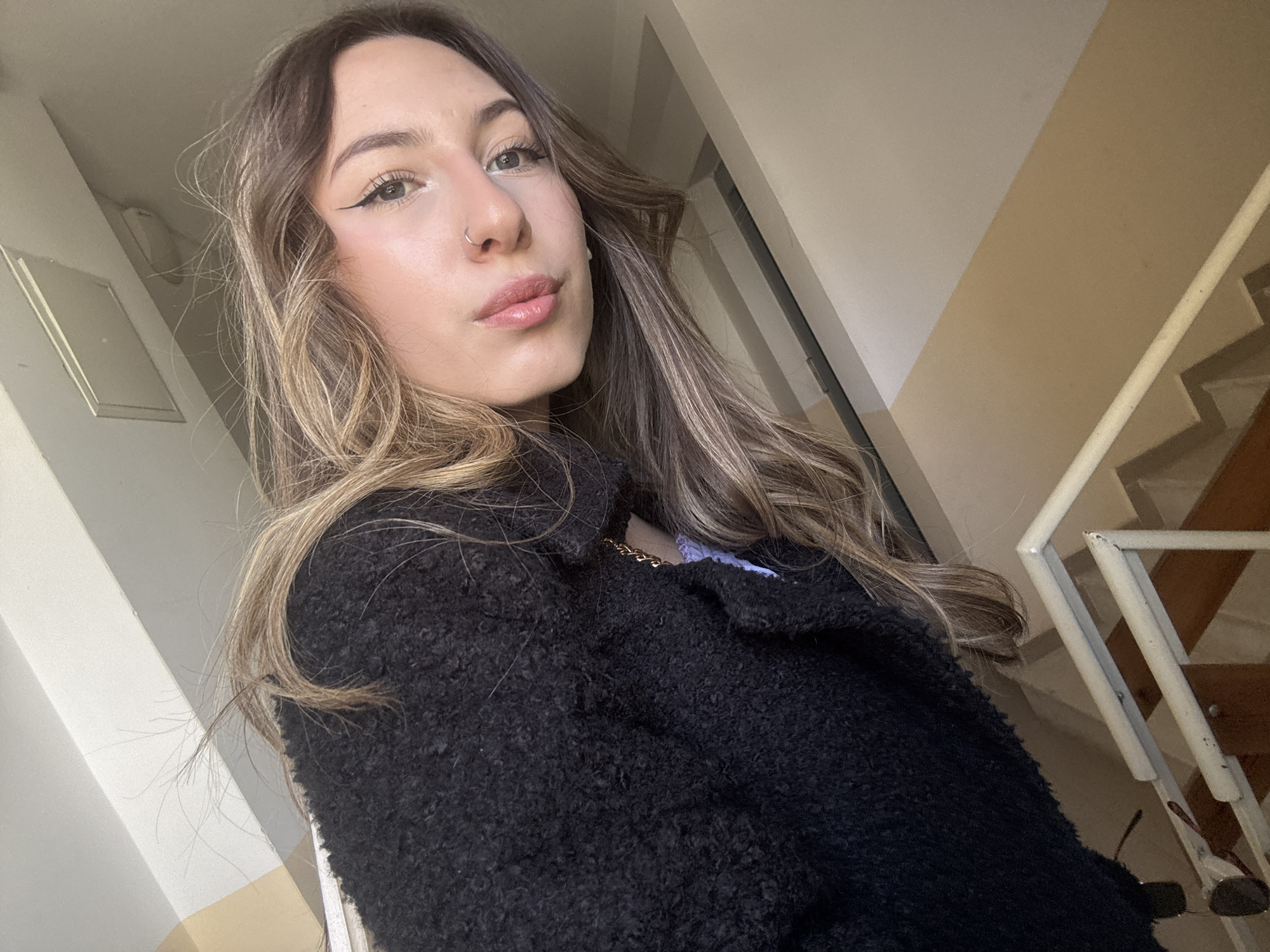 Woman takes selfies on staircase in Veliko Tarnovo