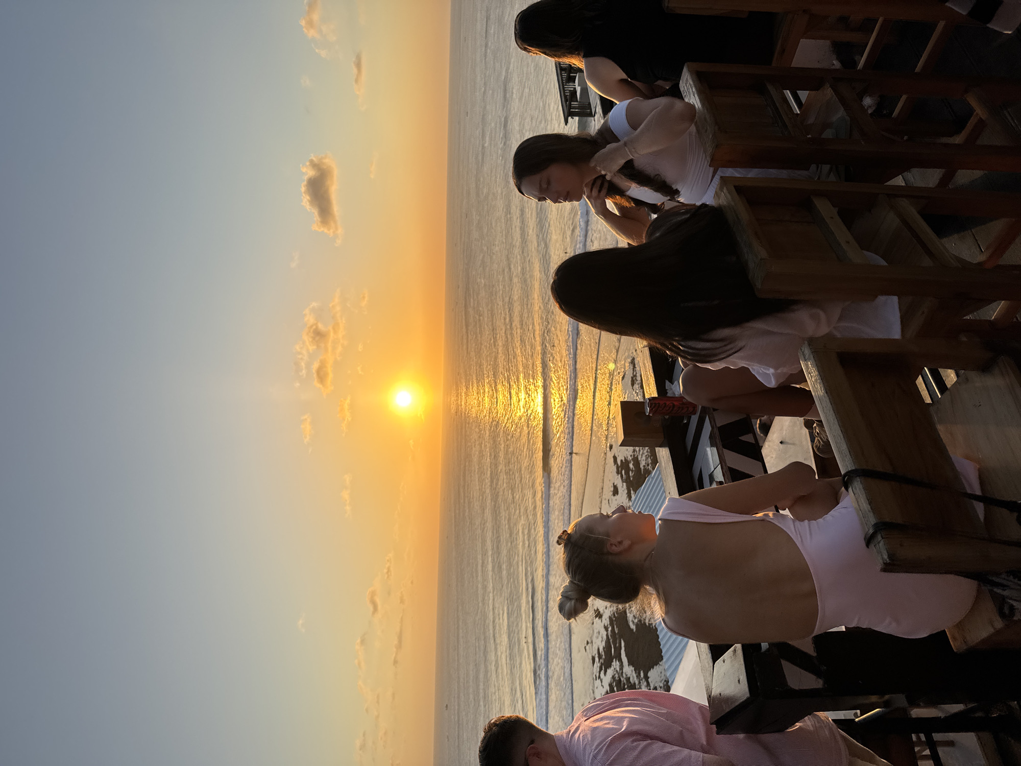 Sunset crowd at Single Fin's clifftop pool bar, Kuta Selatan
