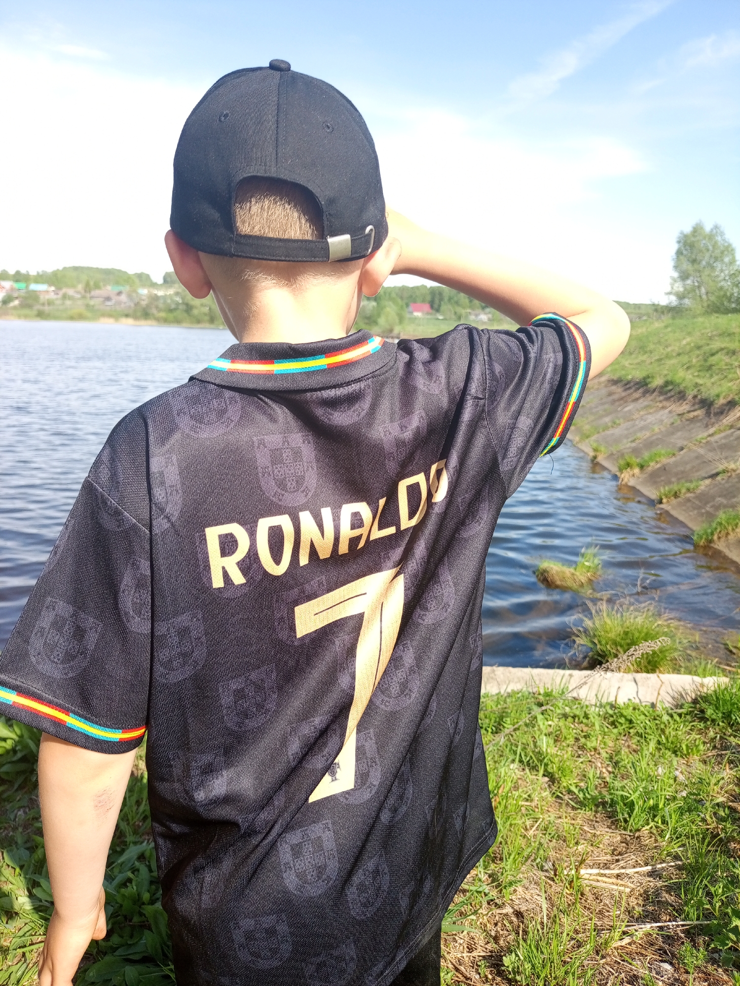 Family fishing outing documented in Уральское, Russia