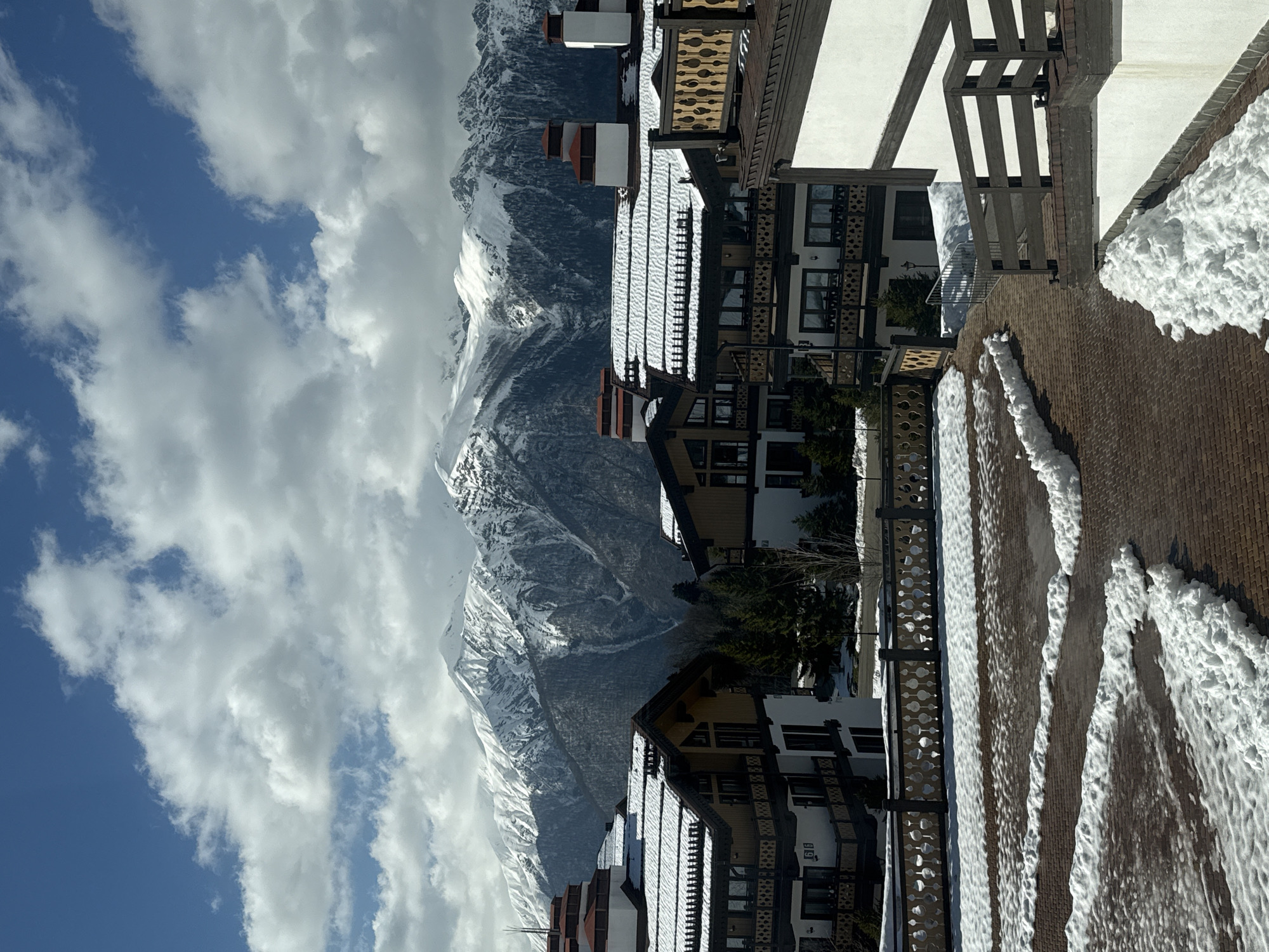 Winter mountain landscape with alpine buildings documented in Russia