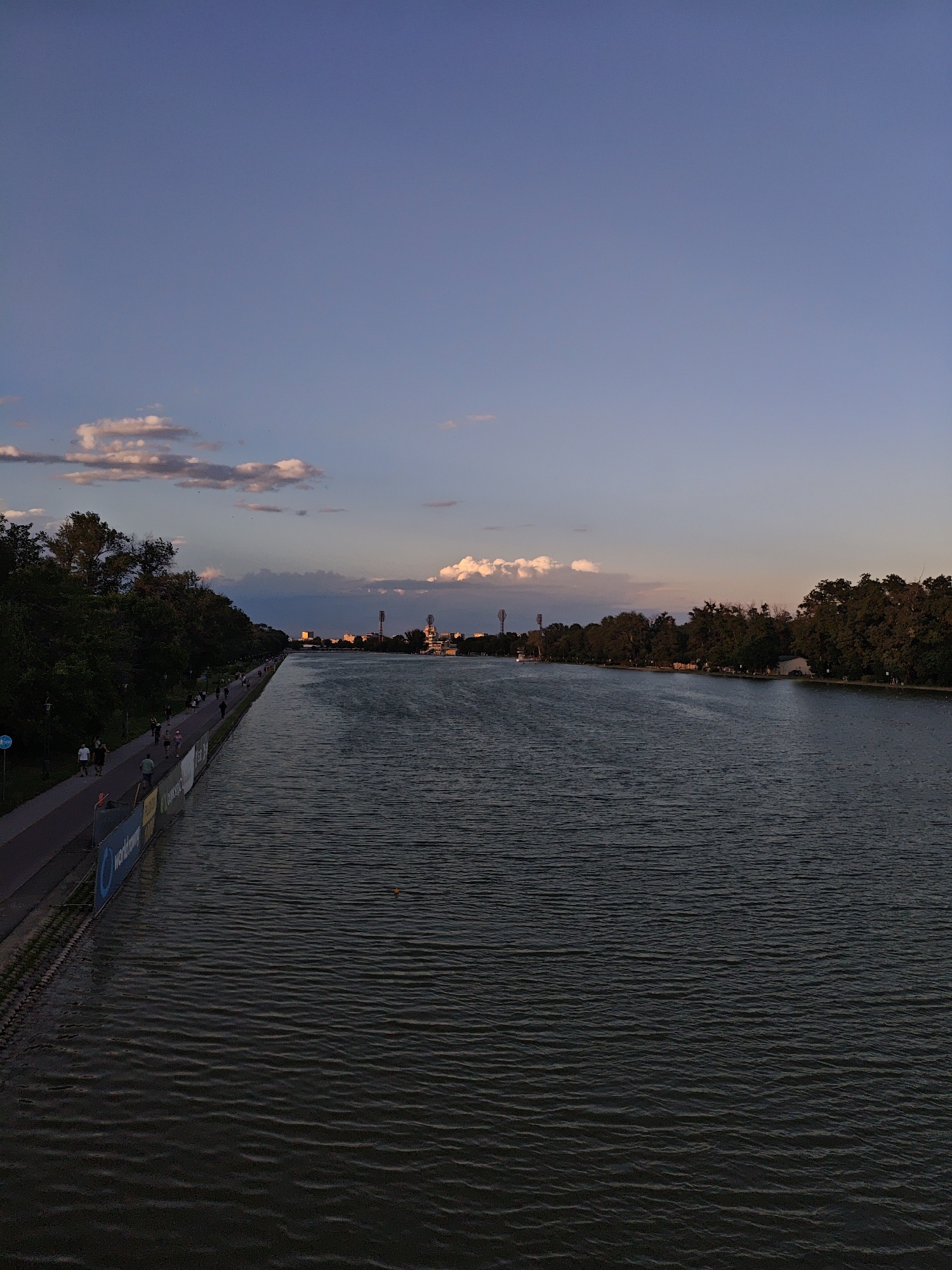 Riverside walkway from afternoon light to dusk