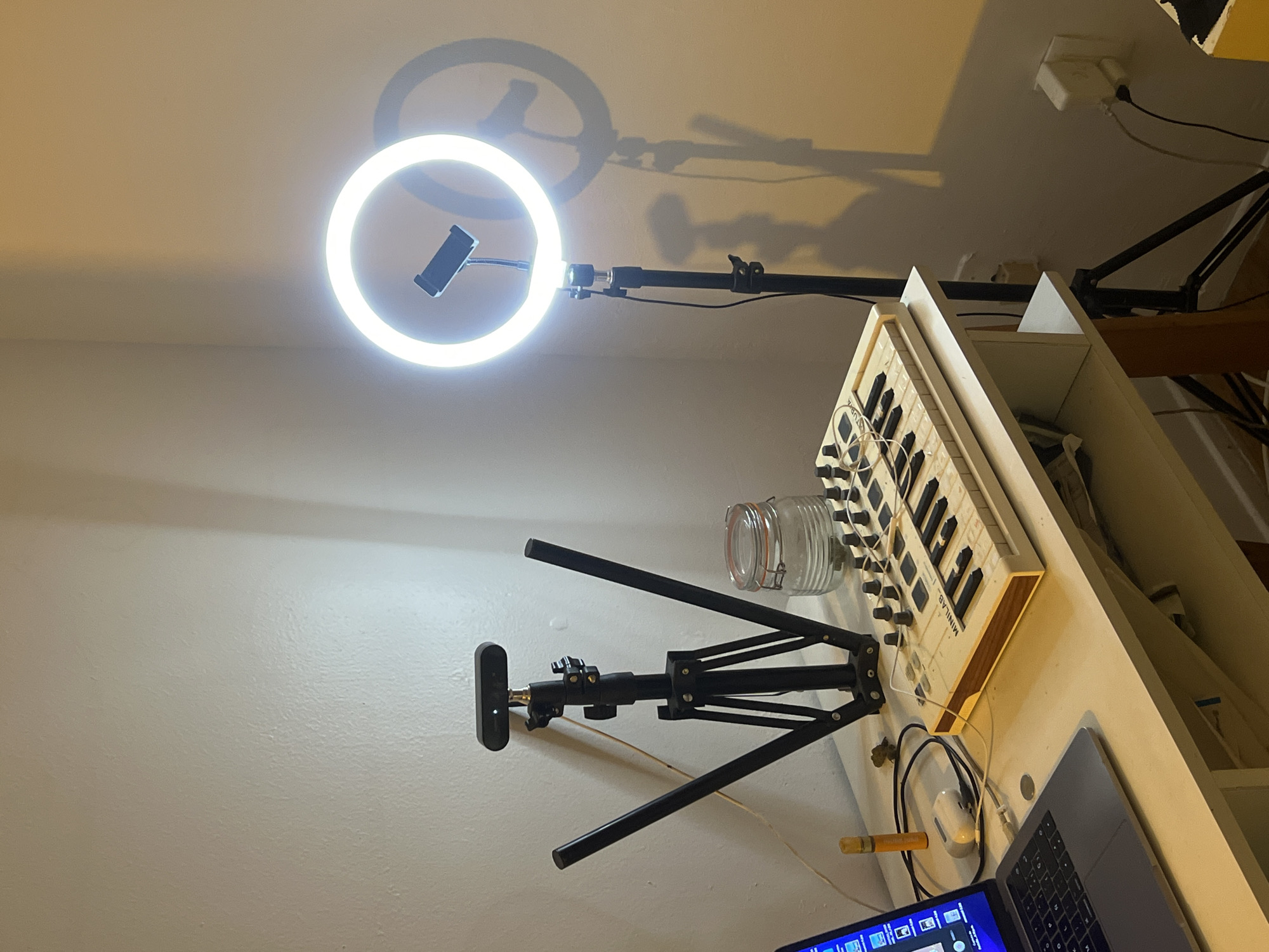 Ring light illuminates cluttered workspace in Mexico City