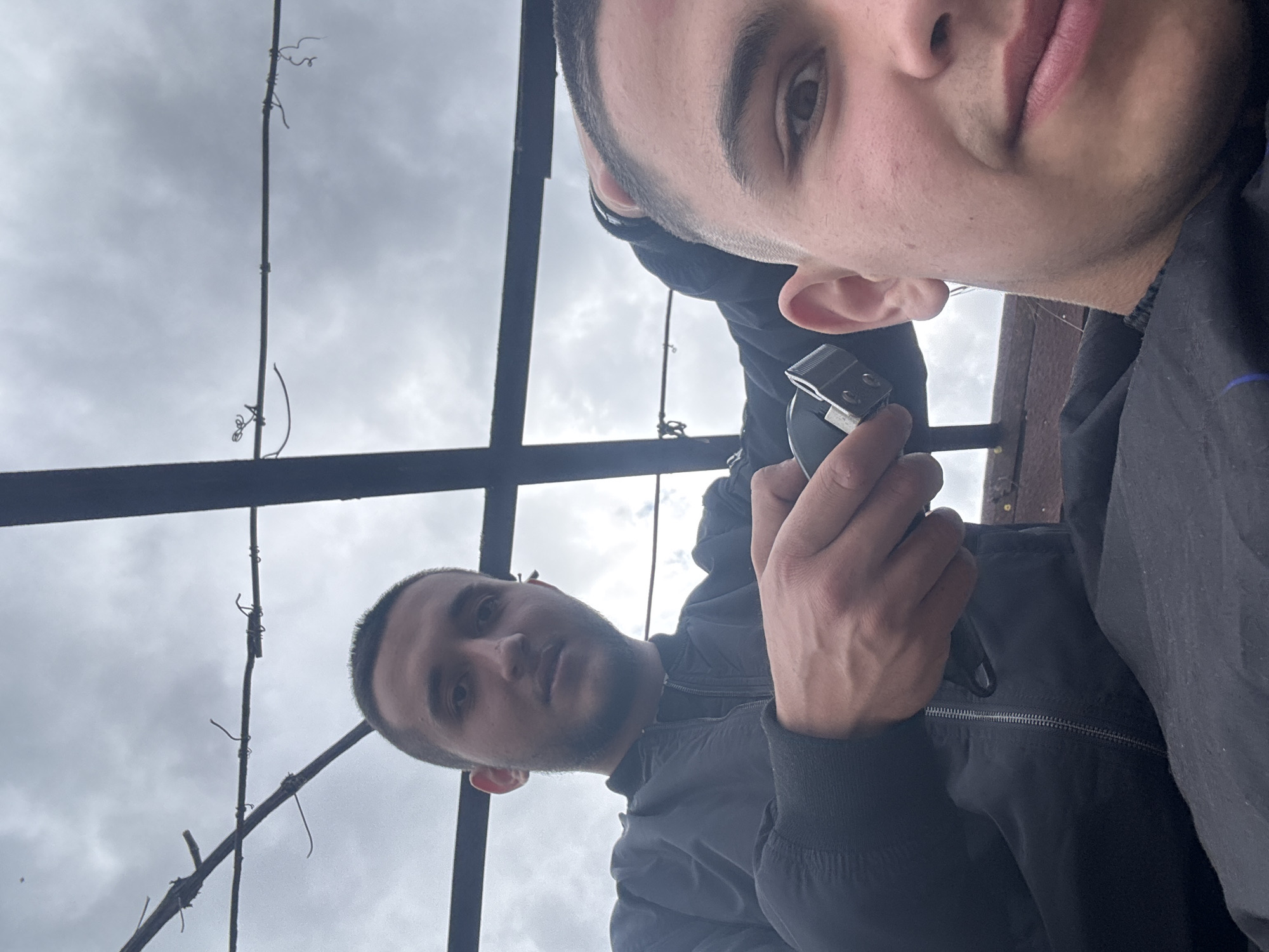 Two men photographed outdoors in Topoli, Bulgaria