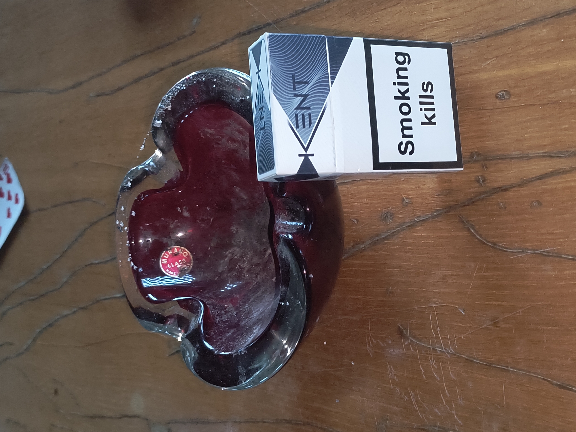 Rainy morning in Rivne — cards, cigarettes, and industrial rooftops