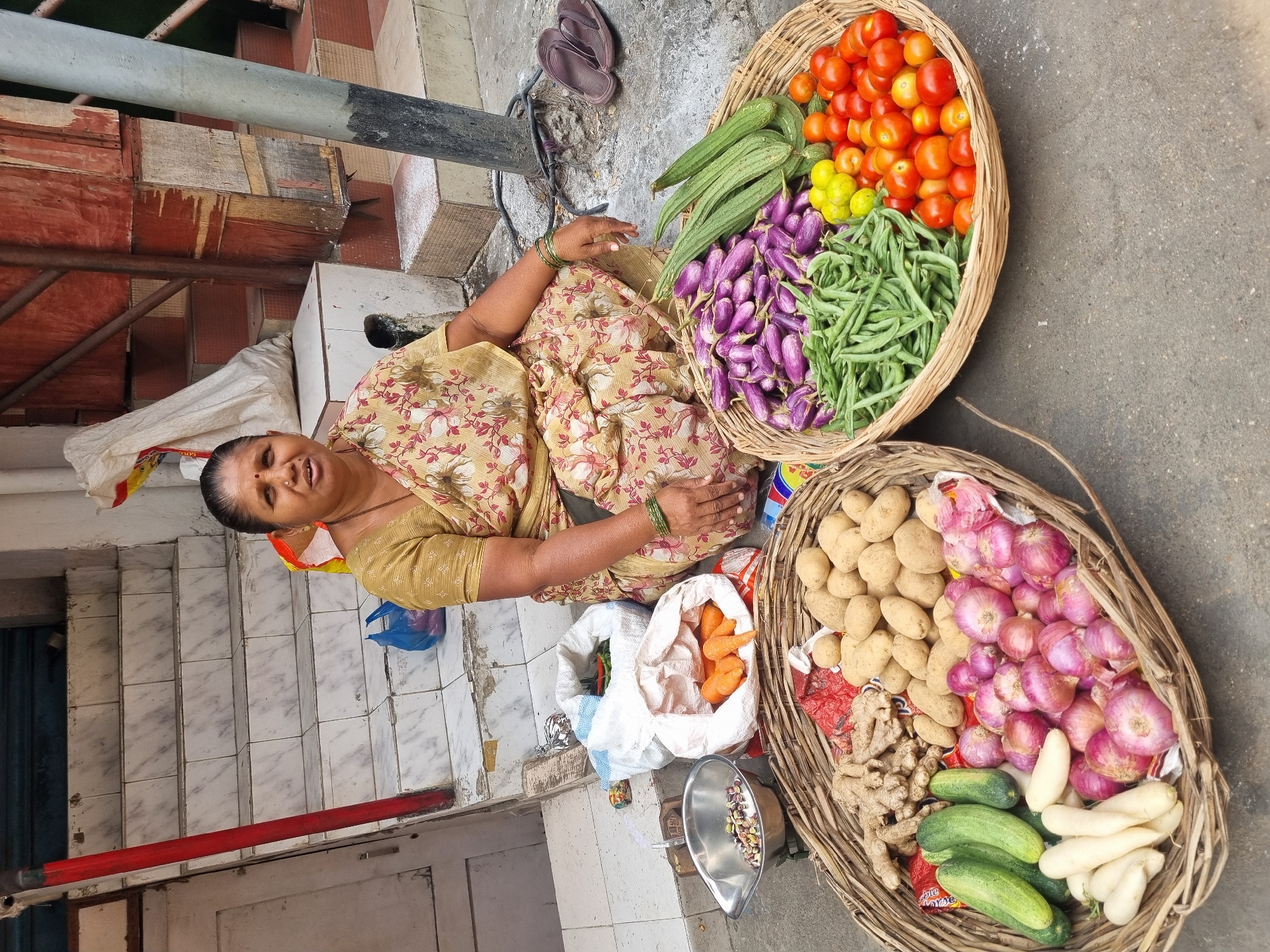 Early morning street commerce and daily life in Puttaparthi