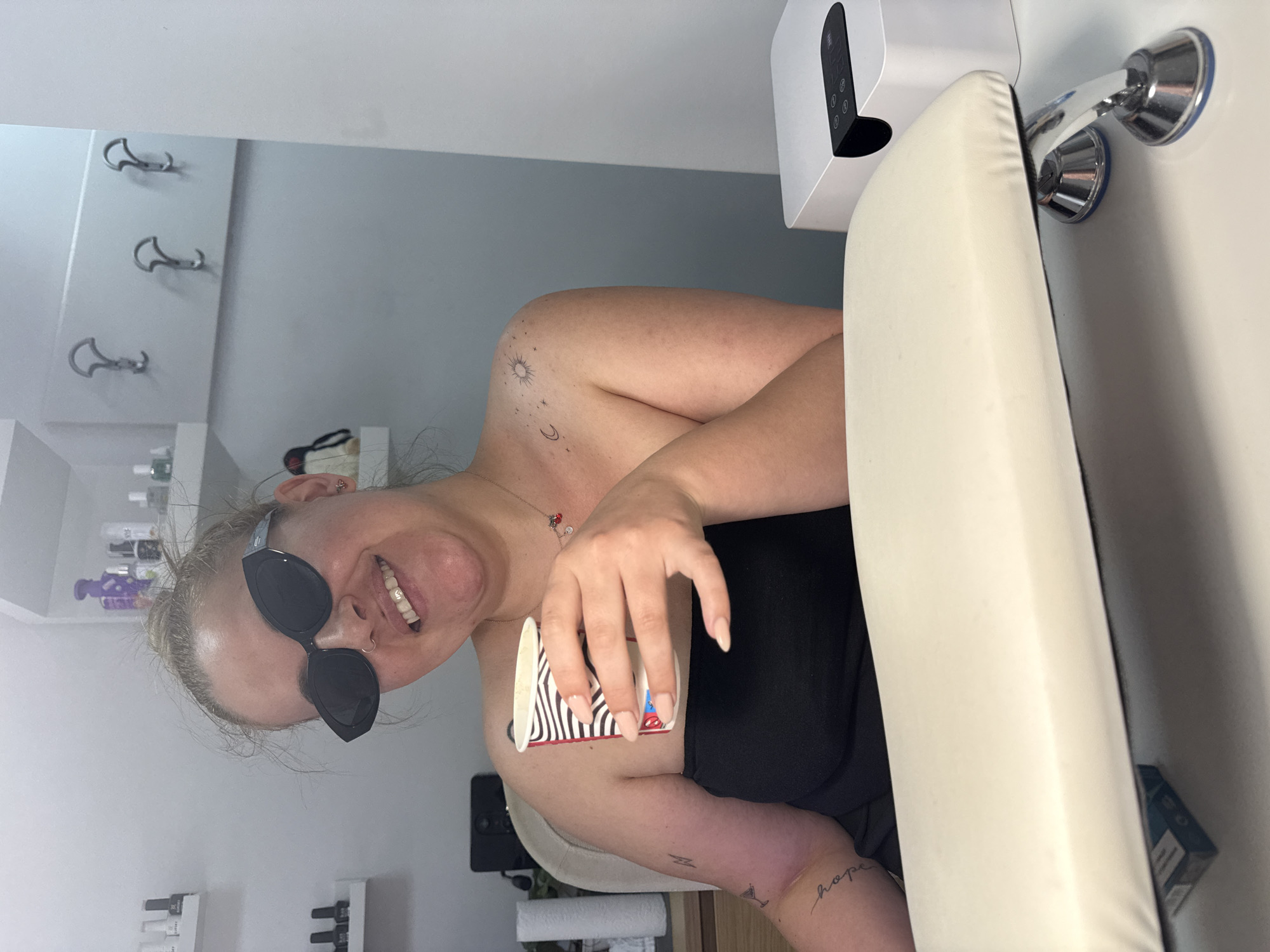 Ordinary morning moments captured in Burgas nail salon, woman with dog