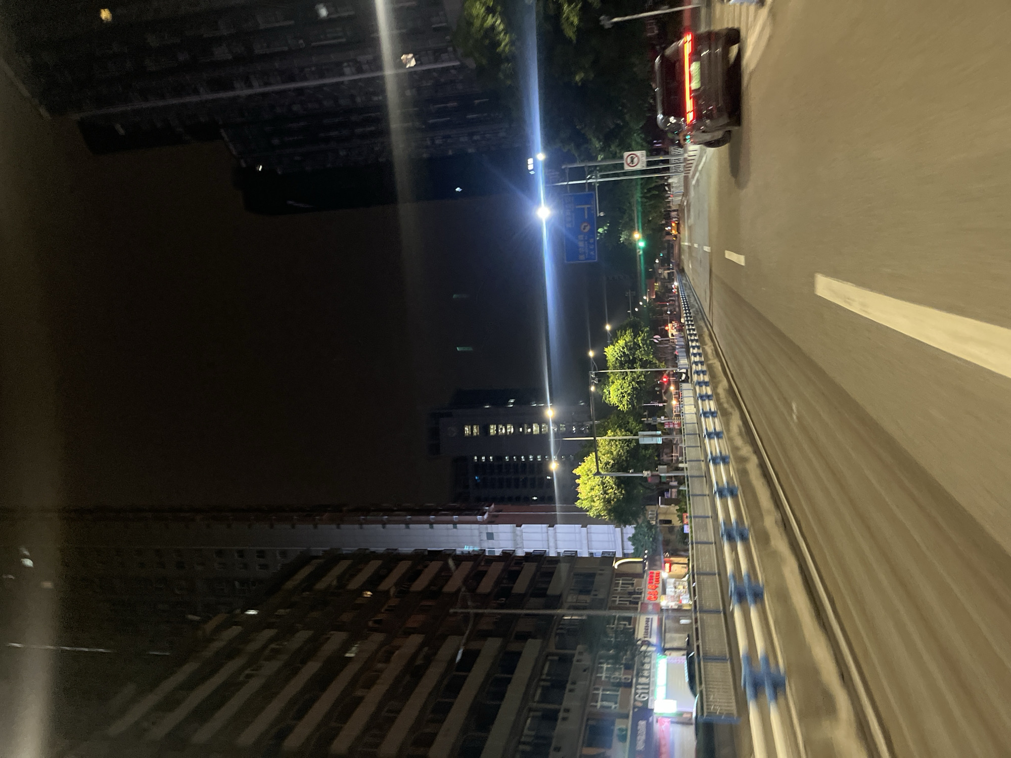 Evening street life documented across two China districts