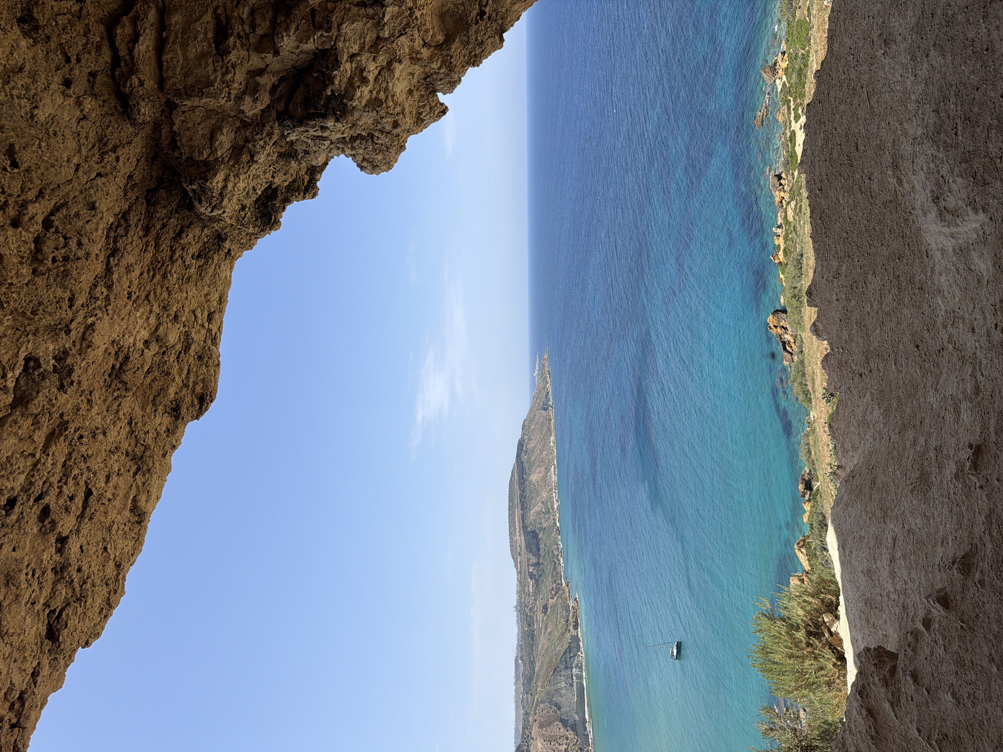 Coastal view captured from rock cave in Xagħra, Malta