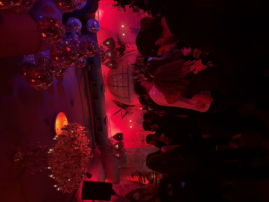 Evening nightclub gathering in Yerevan features dining and DJ entertainment