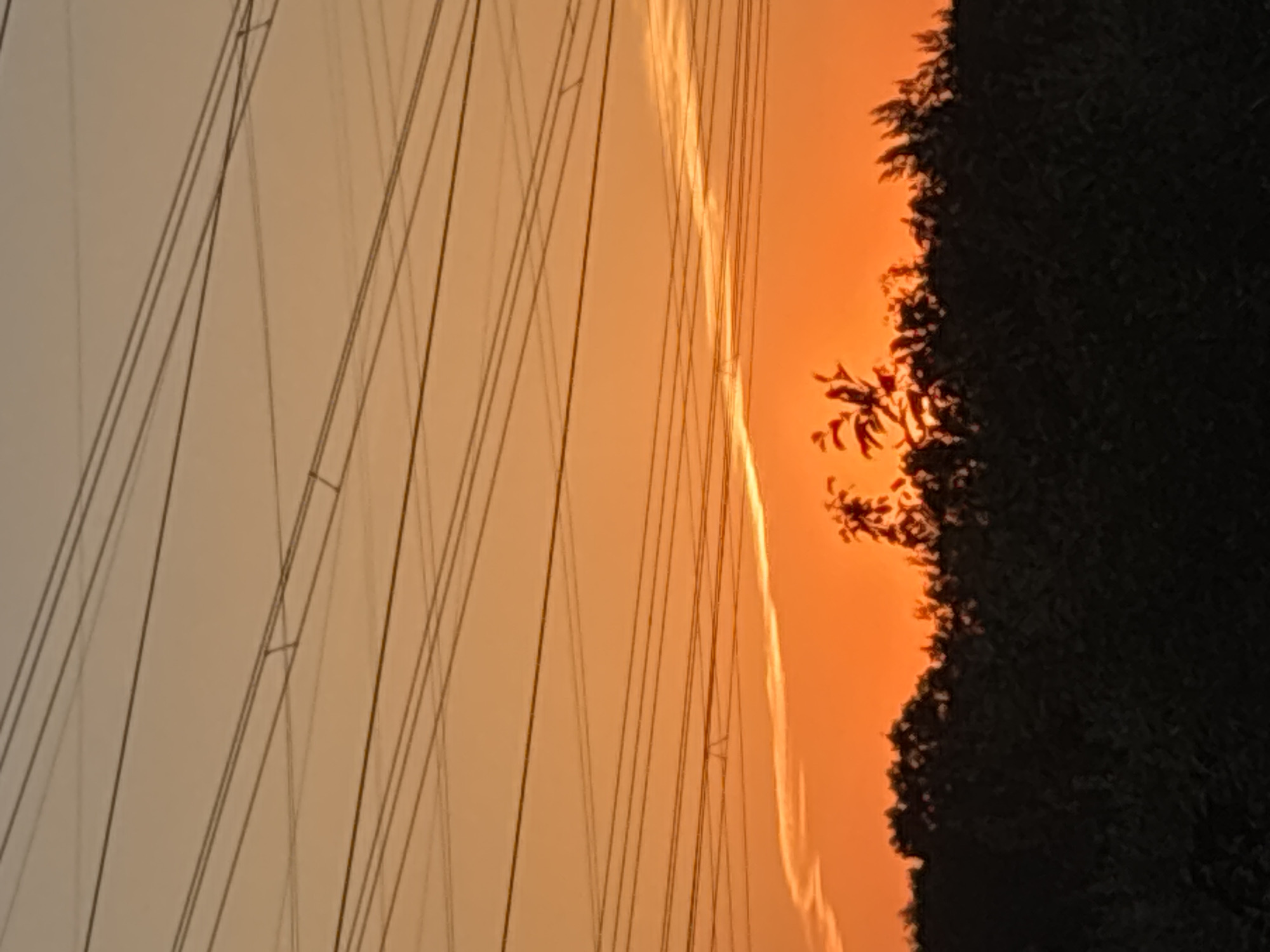 Sunset observed over power lines in Chaikovsky, Russia