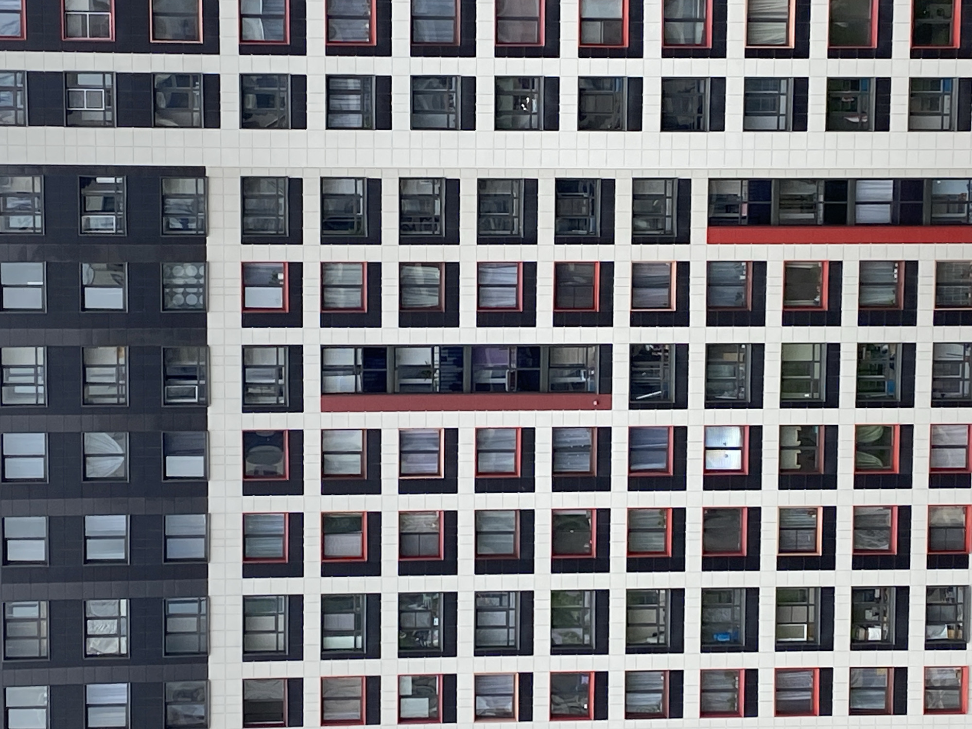 Modern building complex with playground facilities documented by witness