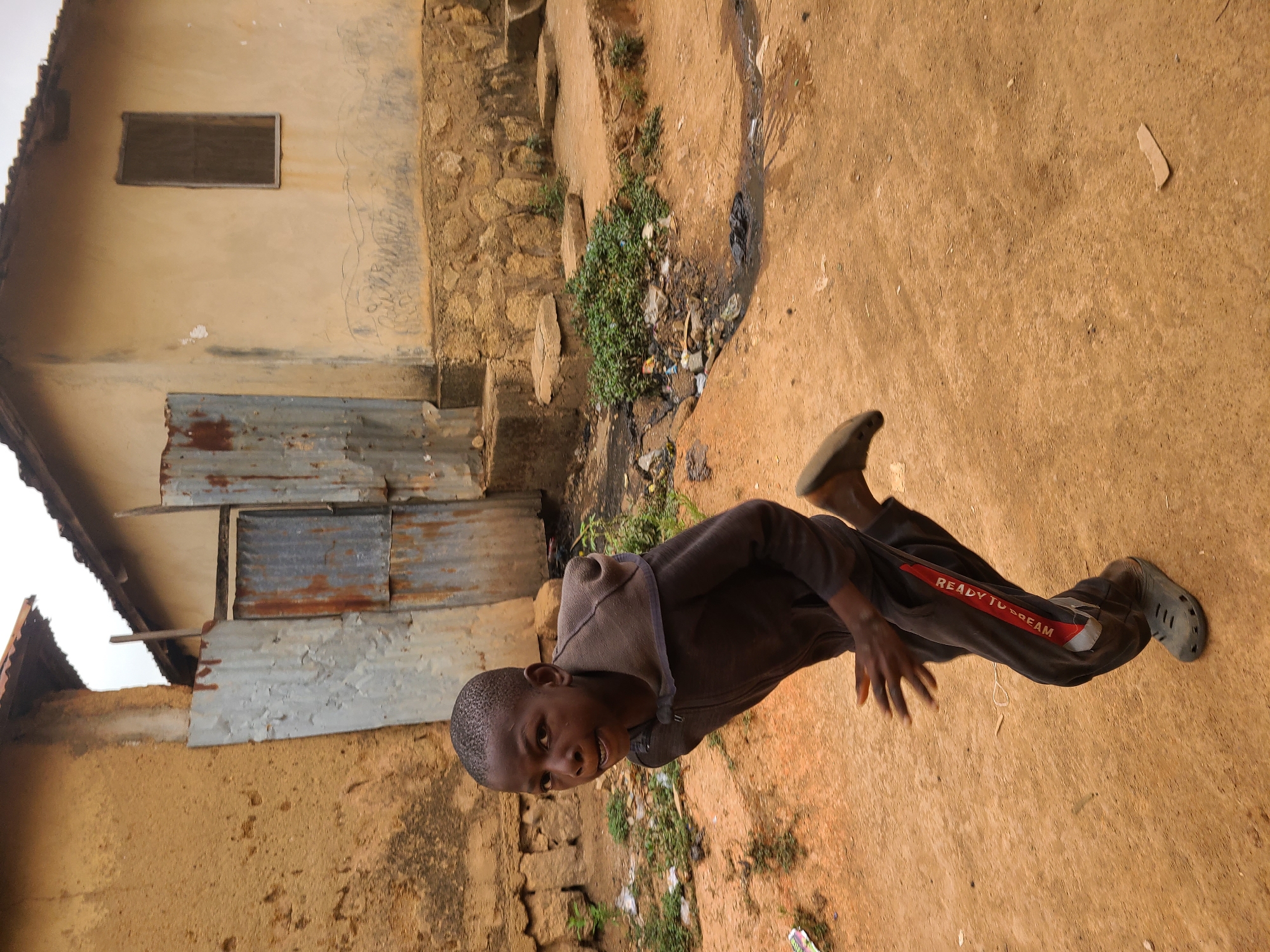 Daily life documented in Jos Nigeria residential neighborhood