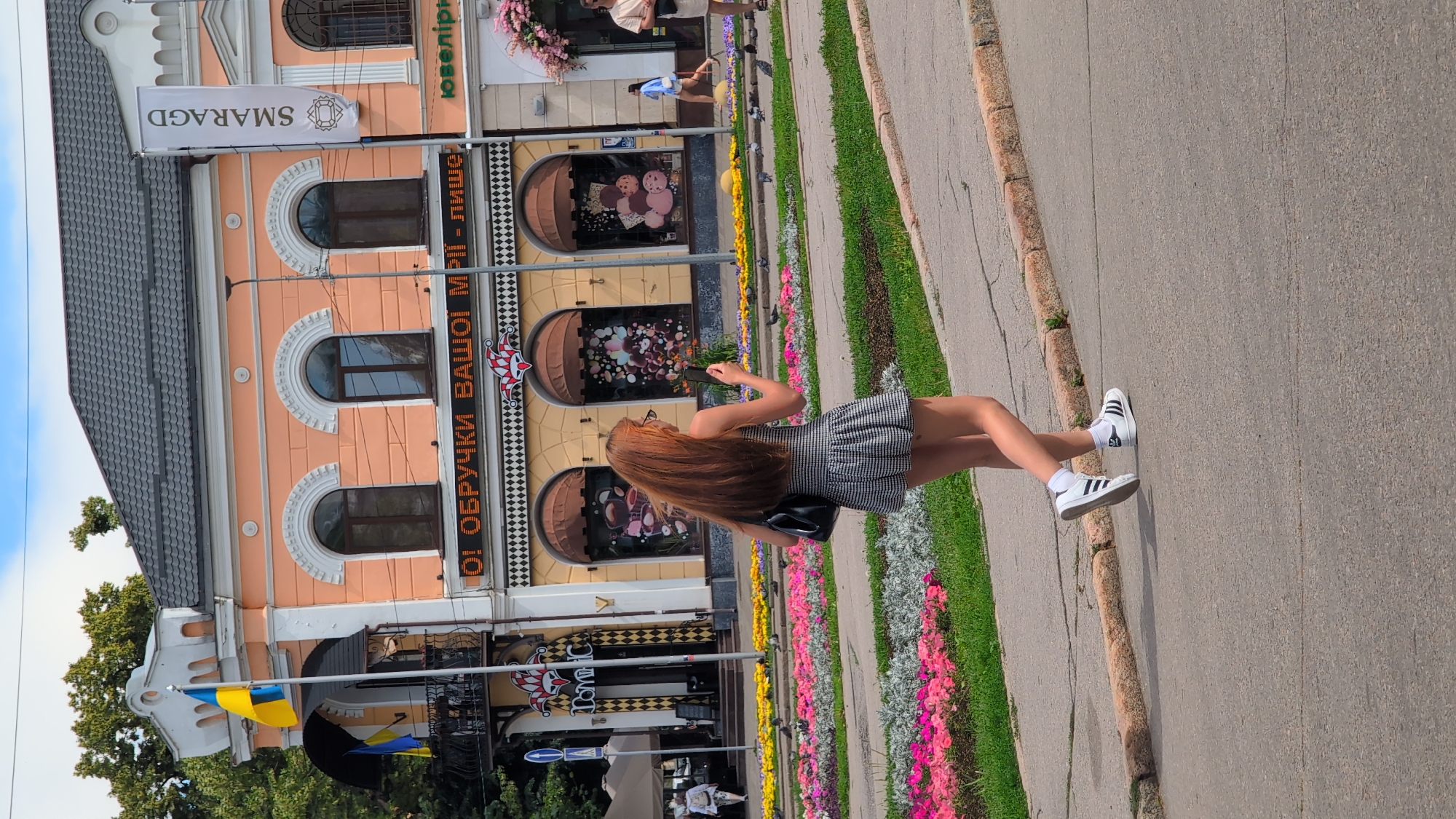 Afternoon street life along Poltava's neoclassical city center