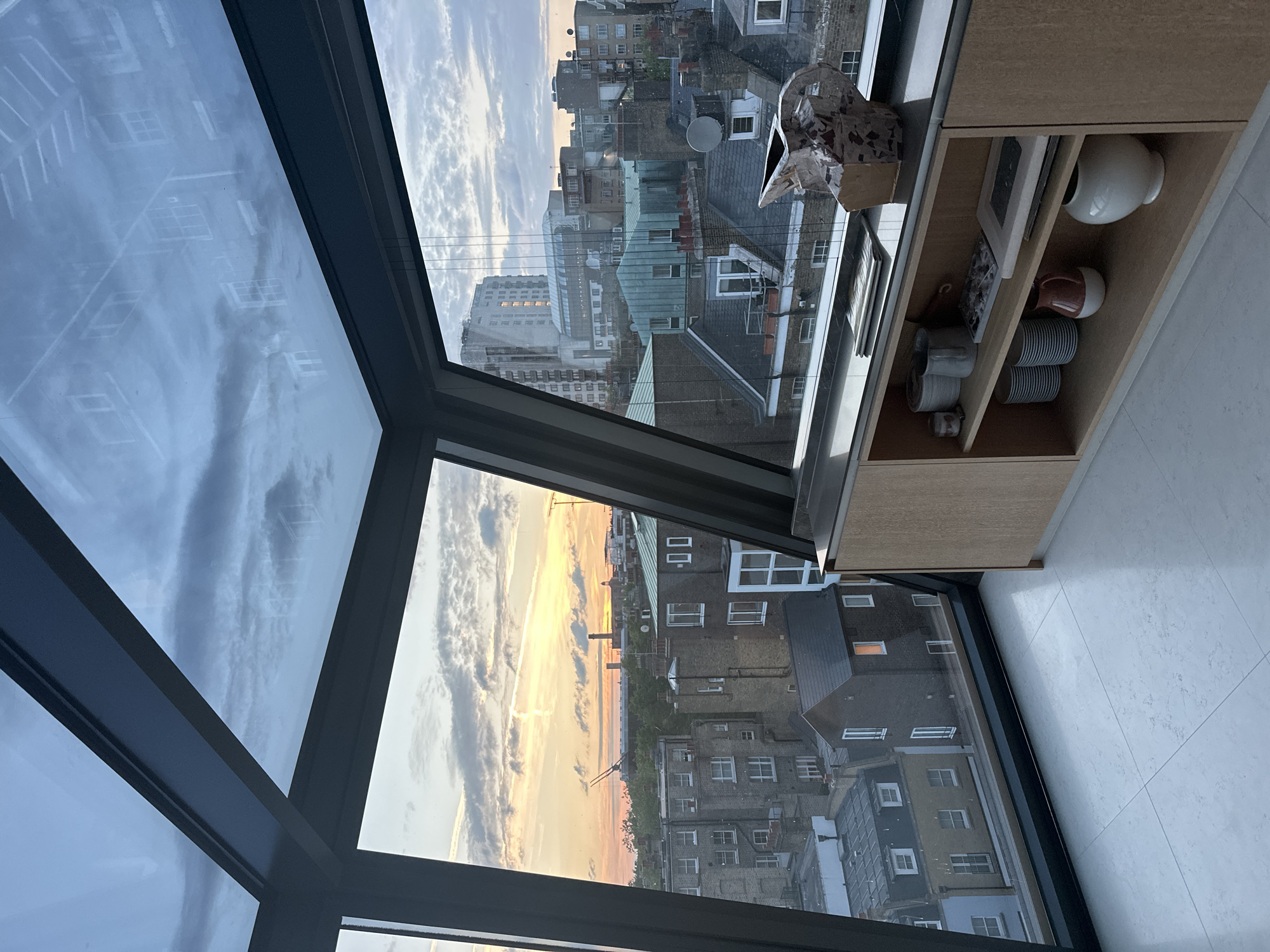 London sunset dining captured from modern high-rise space