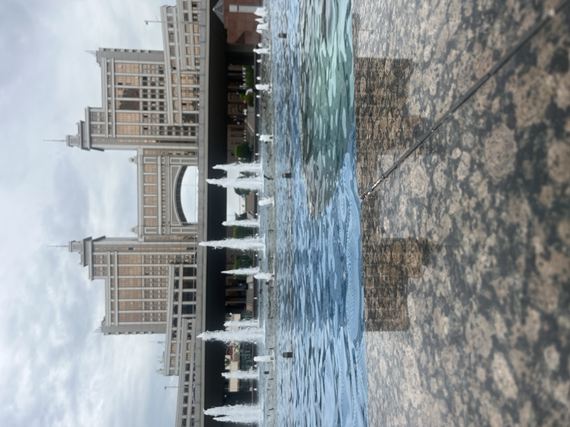 Strolling Astana's Bayterek plaza: fountains, bronze sculptures, landmark architecture