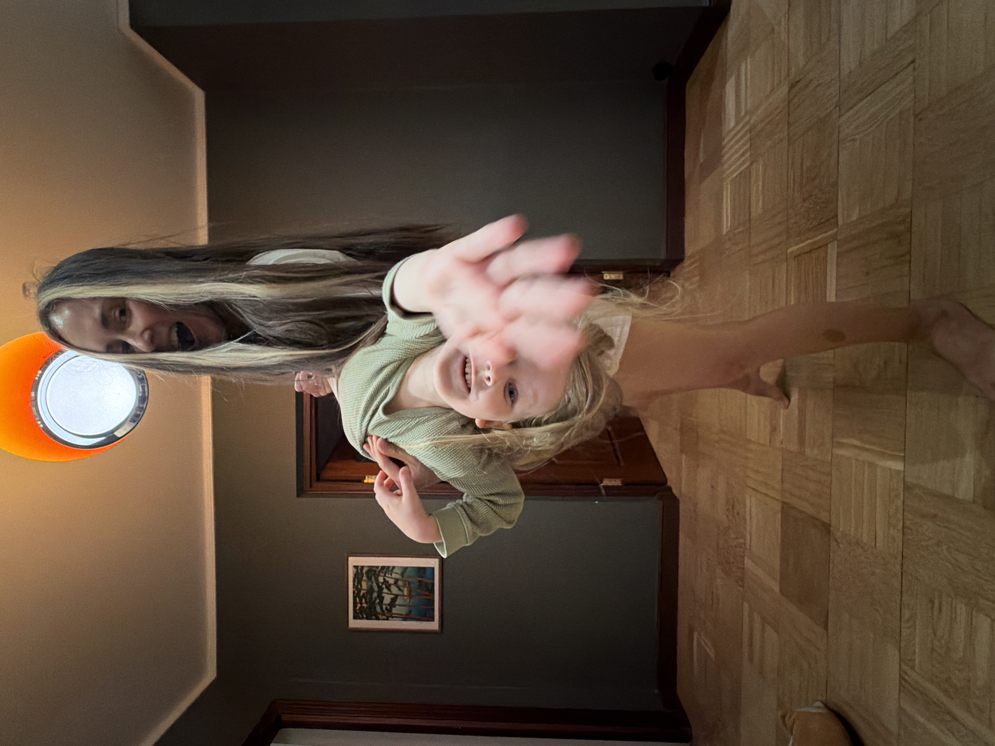 Woman and child play indoors in Khimki home